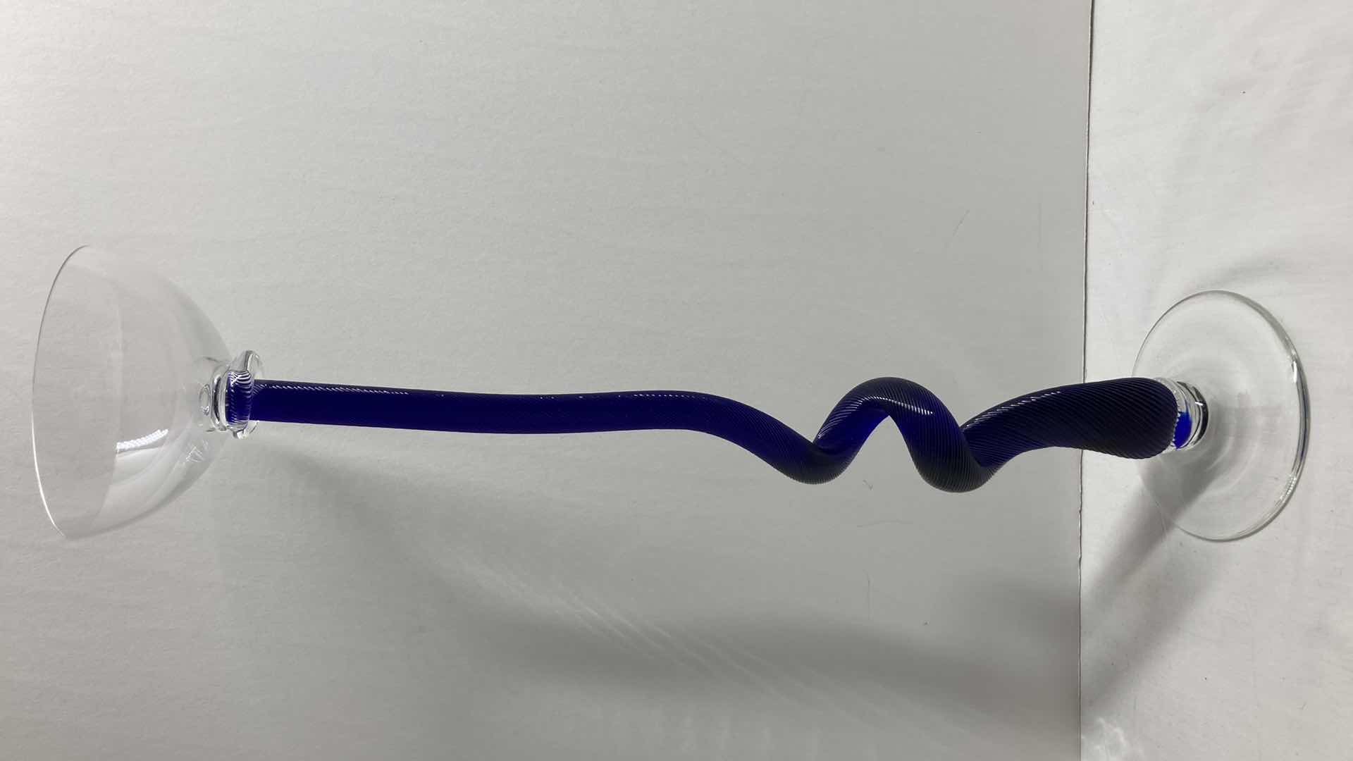 View 1 of LINEAR SPIRAL COBALT BLUE & CLEAR GLASS TEA LIGHT HOLDER 4” X 16.5”