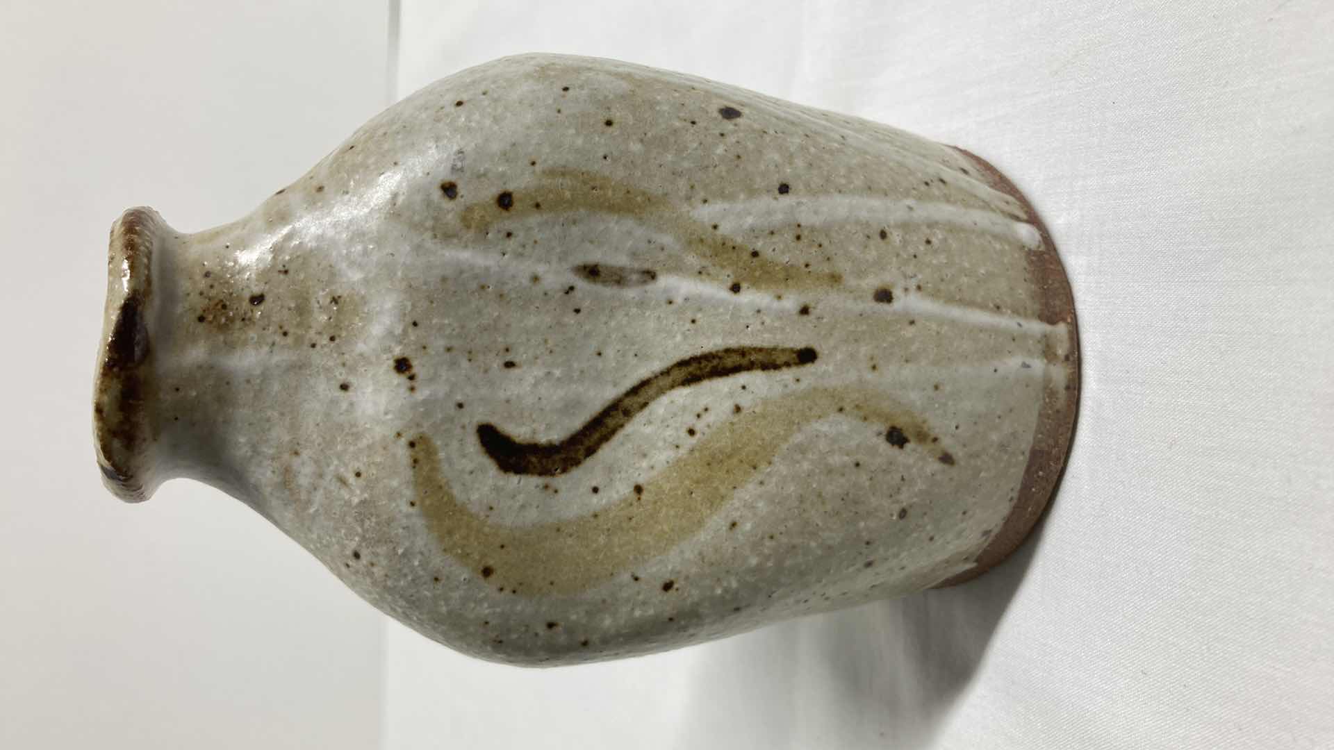 Photo 1 of DISTORTED EARTH TONE POTTERY 3.25” X 3” H5”