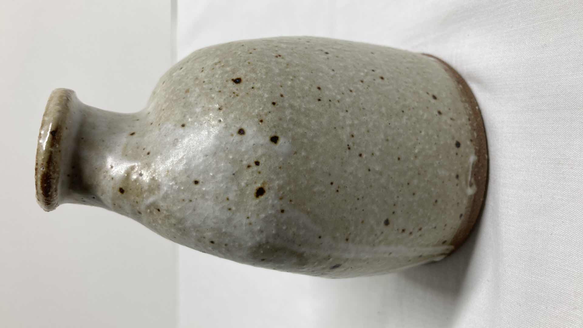 Photo 4 of DISTORTED EARTH TONE POTTERY 3.25” X 3” H5”