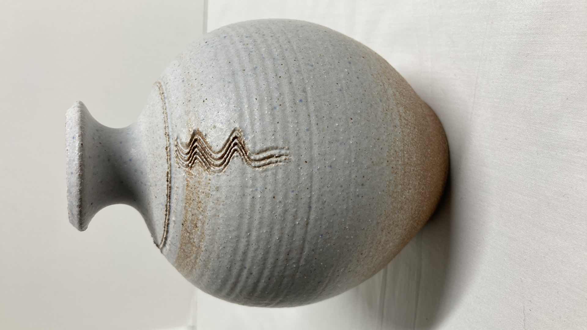 Photo 1 of SOUTHWESTERN STYLE EARTH TONE VASE BY PALME 4.25” X 6”