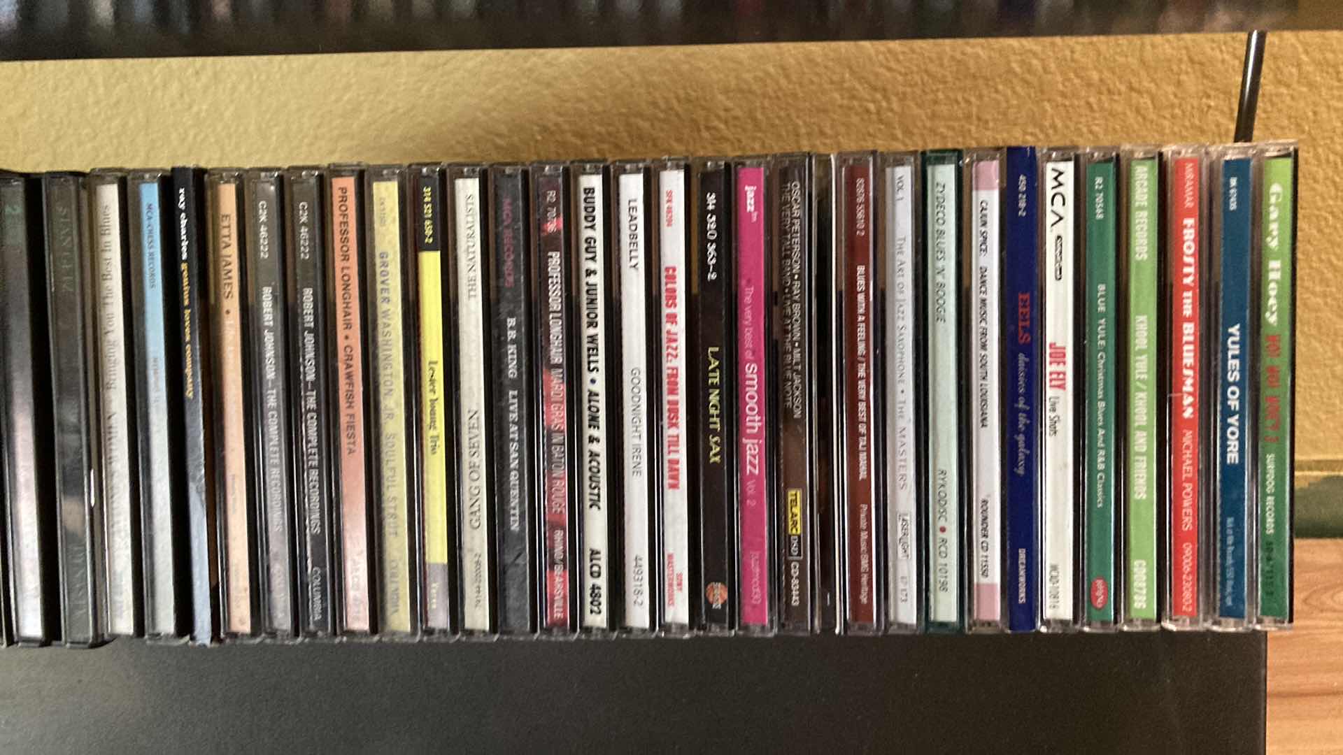 Photo 1 of JAZZ & BLUES MUSIC CD’S (APPROX 200) W METAL RACK 19.25” X 13.25” H35.5”