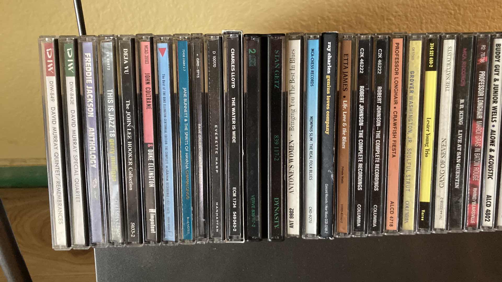 Photo 1 of JAZZ & BLUES MUSIC CD’S (APPROX 200) W METAL RACK 19.25” X 13.25” H35.5”