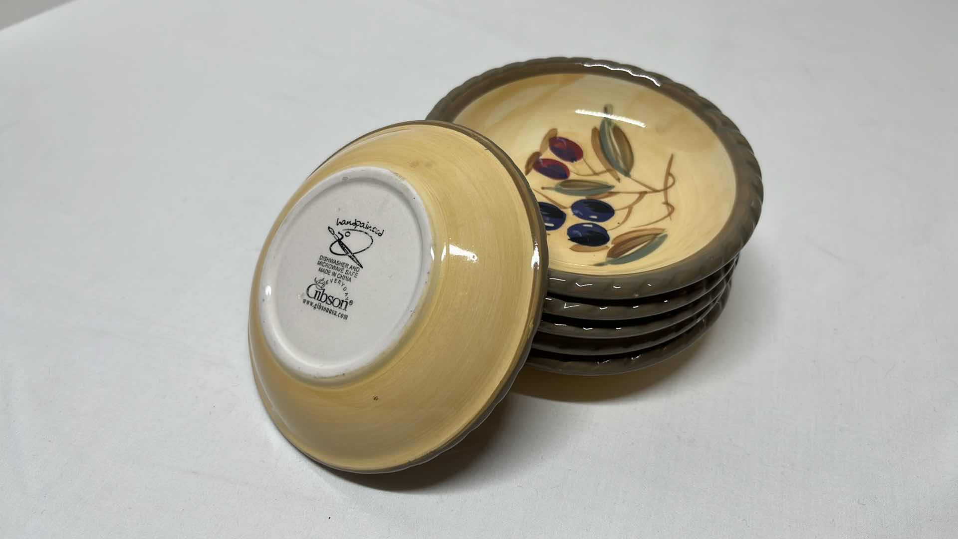 Photo 4 of GIBSON HOUSEWARES 14 PC HAND-PAINTED DISH WARE SET