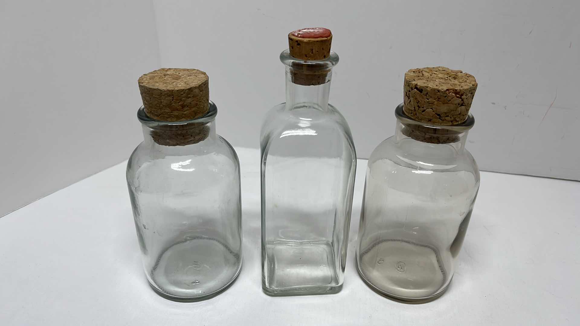 Photo 1 of 13” CANISTER FLIP TOP GREEN GLASS JAR, 3 GLASS JARS W CORKS & 2 GLASS JARS NO LIDS