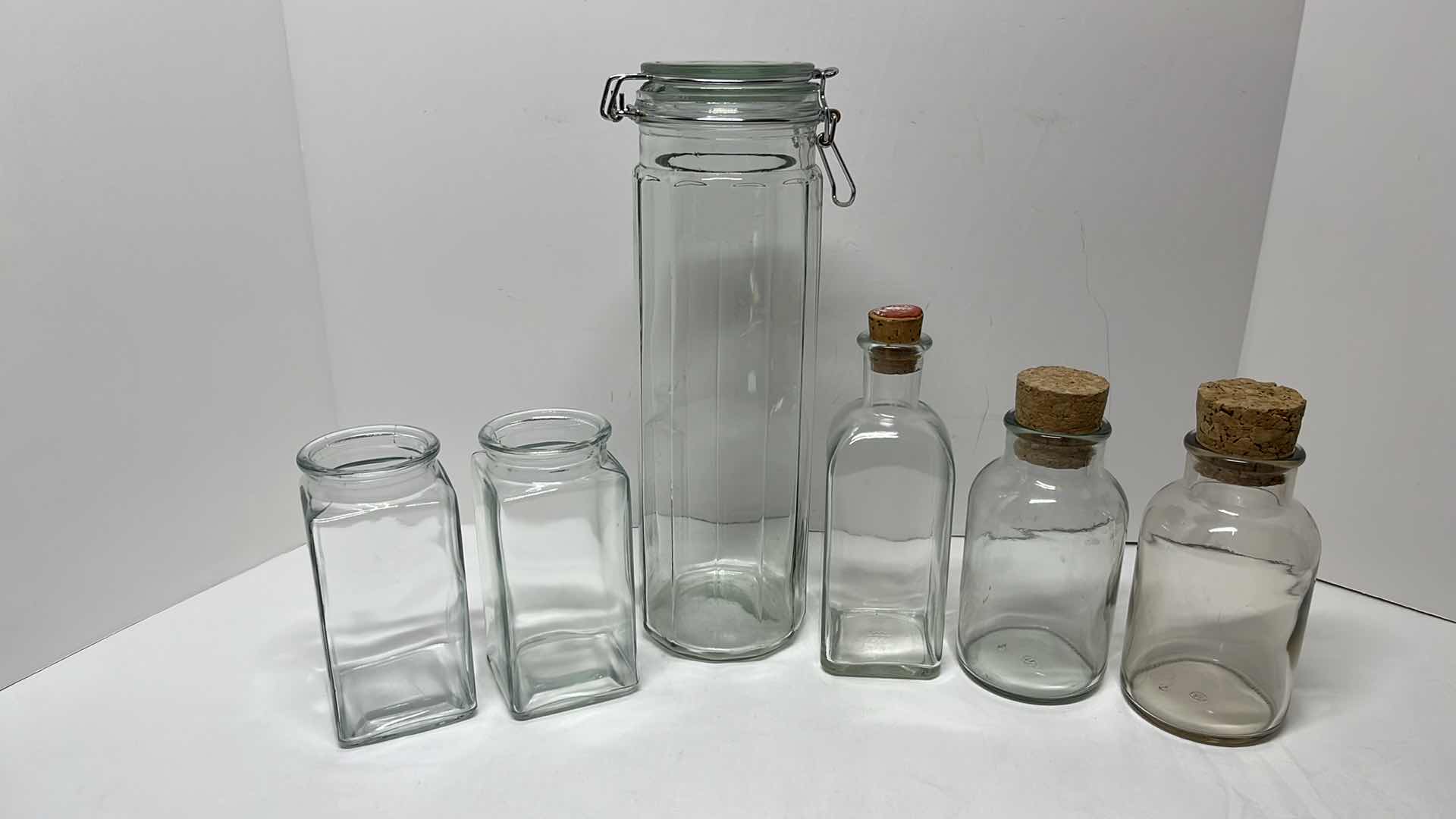 Photo 1 of 13” CANISTER FLIP TOP GREEN GLASS JAR, 3 GLASS JARS W CORKS & 2 GLASS JARS NO LIDS