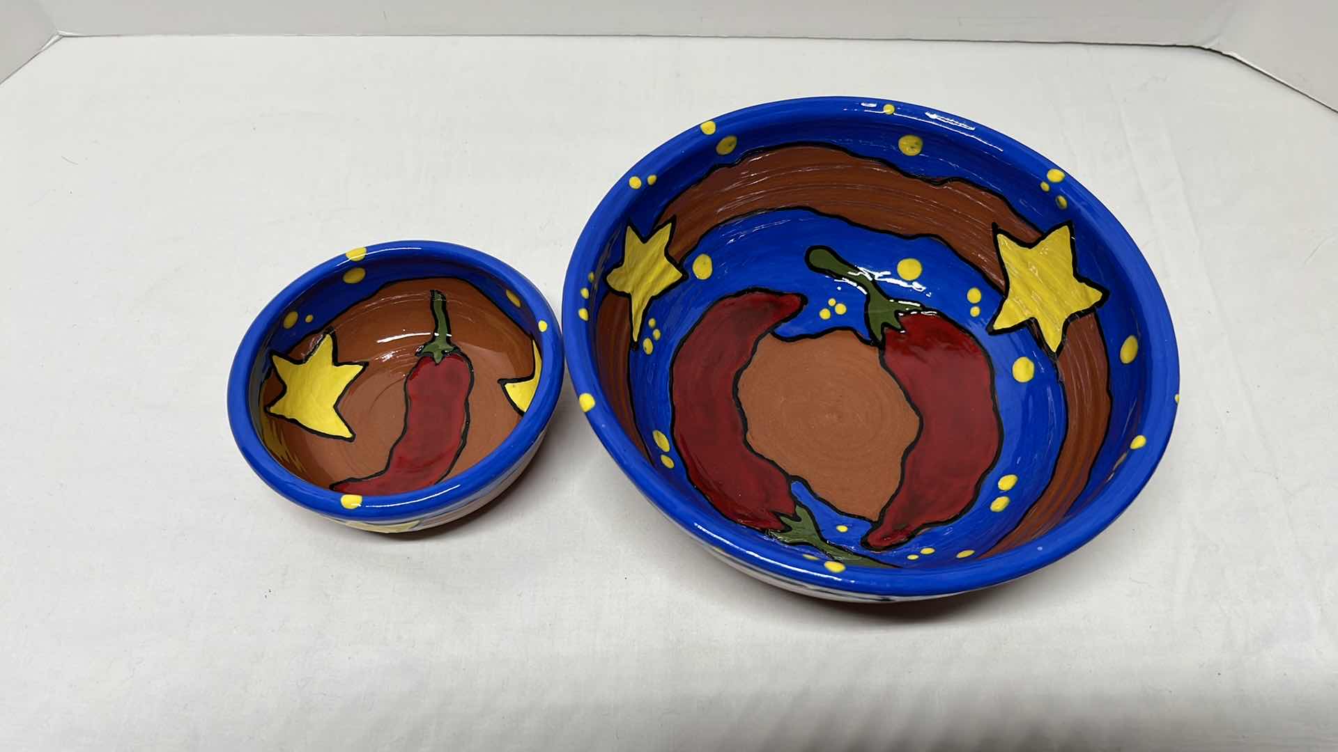 Photo 1 of HAND-PAINTED CERAMIC CHILE PEPPER MIXING BOWLS W CERAMIC HANGING CHILE PEPPERS