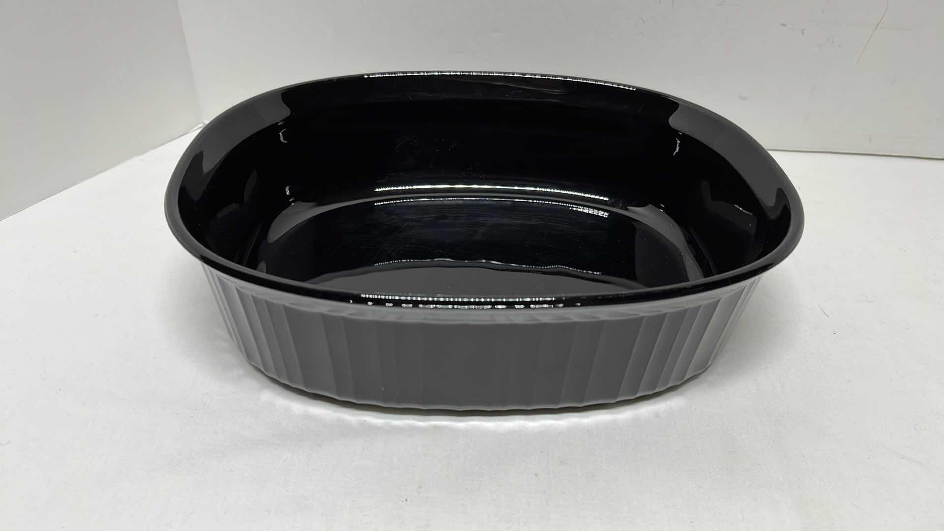 Photo 2 of 2 BLACK CORNING WARE DISHES, MIXING BOWL, 2 SMALL RAMEKINS, CREAM & SUGAR DISHES W BLACK CHILE PEPPER PLATE (9 PCS)