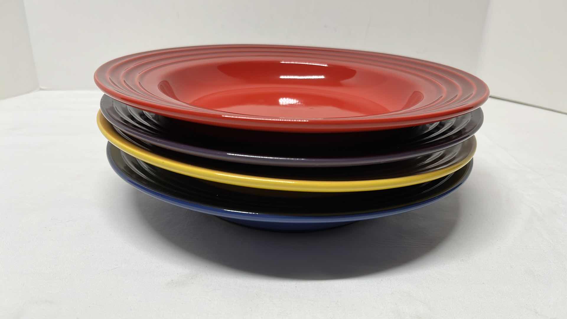 Photo 1 of LE CREUSET STONEWARE SET OF 4 SOUP BOWLS, 10.5”