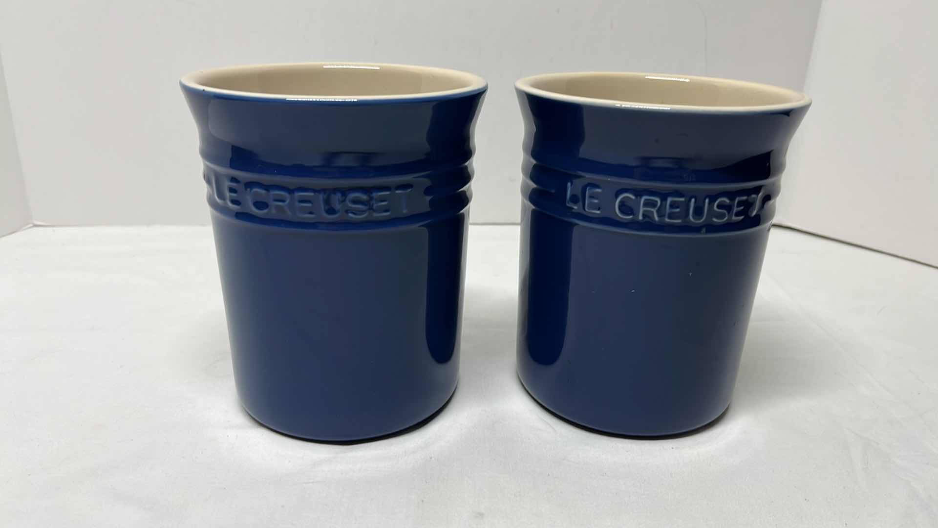 Photo 1 of LE CREUSET STONEWARE UTENSIL HOLDERS SET OF 2, 6”H