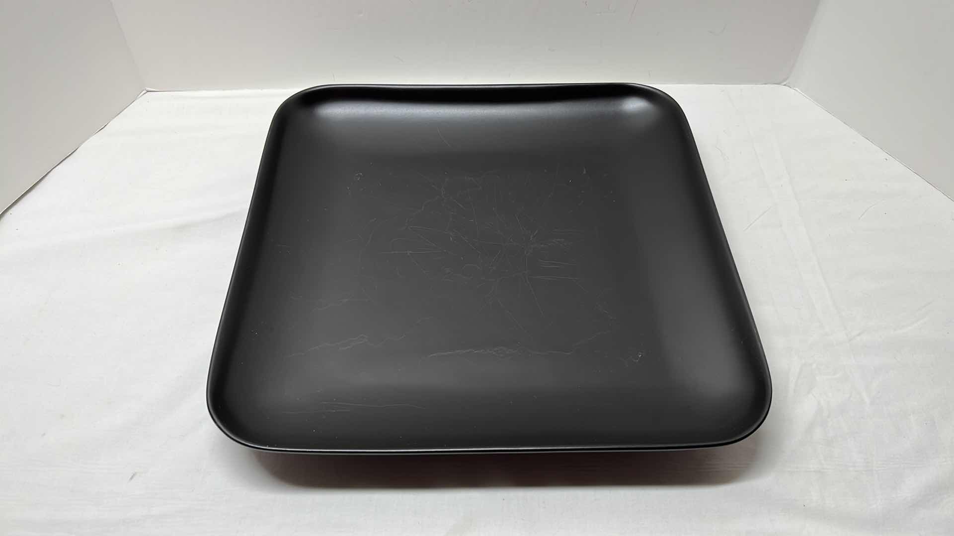 Photo 1 of 2 PCS CERAMIC SERVING PLATTERS 
BLACK 13.5” X 13.5”
WHITE 14.25” X 18”