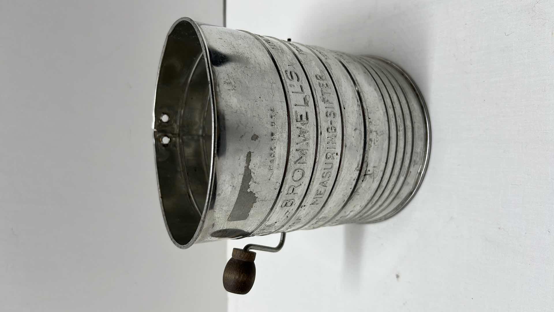 Photo 3 of LARGE MEASURING SIFTER, 35 OZ BLACK MEASURING CUP, 2 COOKIE CUTTERS, 3 LOAF PANS, (4) 3.5” ROUND DOUGH CUTTERS, MEASURING SPOON SET, ROLLING STICK AND DOUGH BLENDER