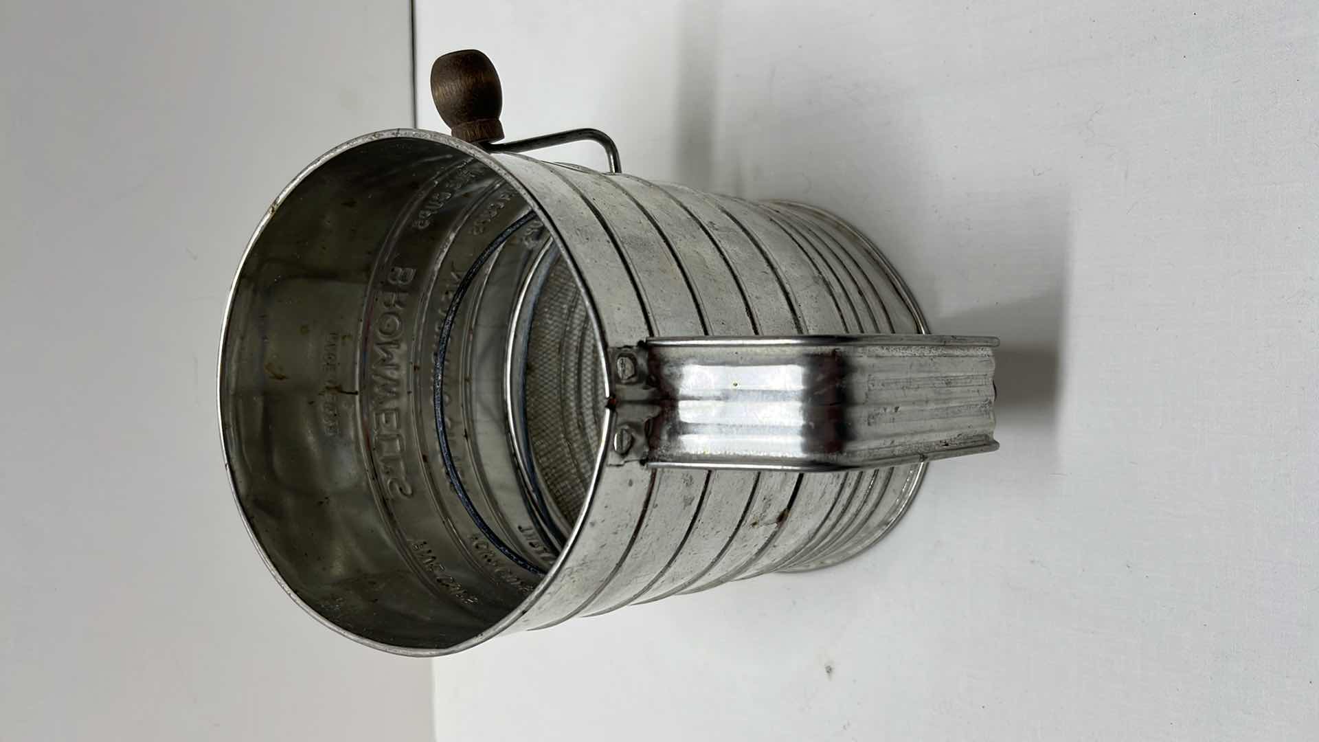 Photo 2 of LARGE MEASURING SIFTER, 35 OZ BLACK MEASURING CUP, 2 COOKIE CUTTERS, 3 LOAF PANS, (4) 3.5” ROUND DOUGH CUTTERS, MEASURING SPOON SET, ROLLING STICK AND DOUGH BLENDER