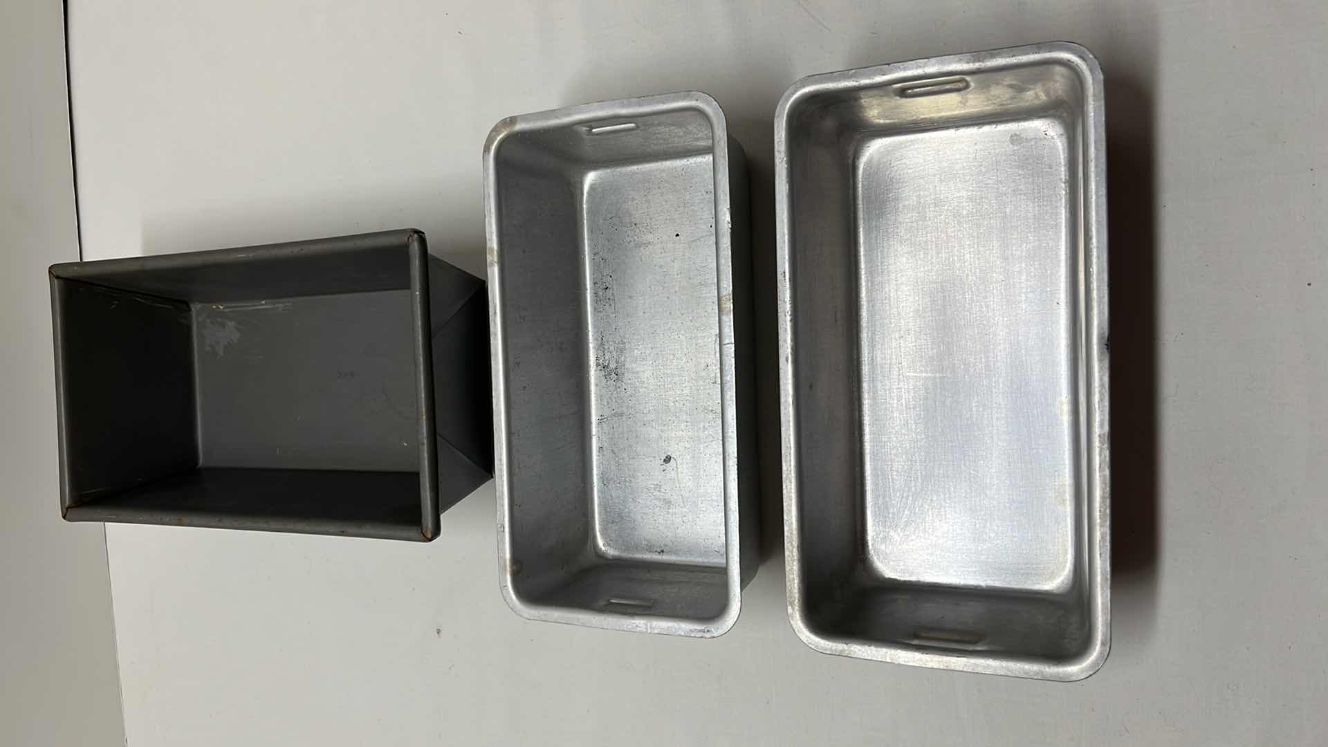 Photo 7 of LARGE MEASURING SIFTER, 35 OZ BLACK MEASURING CUP, 2 COOKIE CUTTERS, 3 LOAF PANS, (4) 3.5” ROUND DOUGH CUTTERS, MEASURING SPOON SET, ROLLING STICK AND DOUGH BLENDER