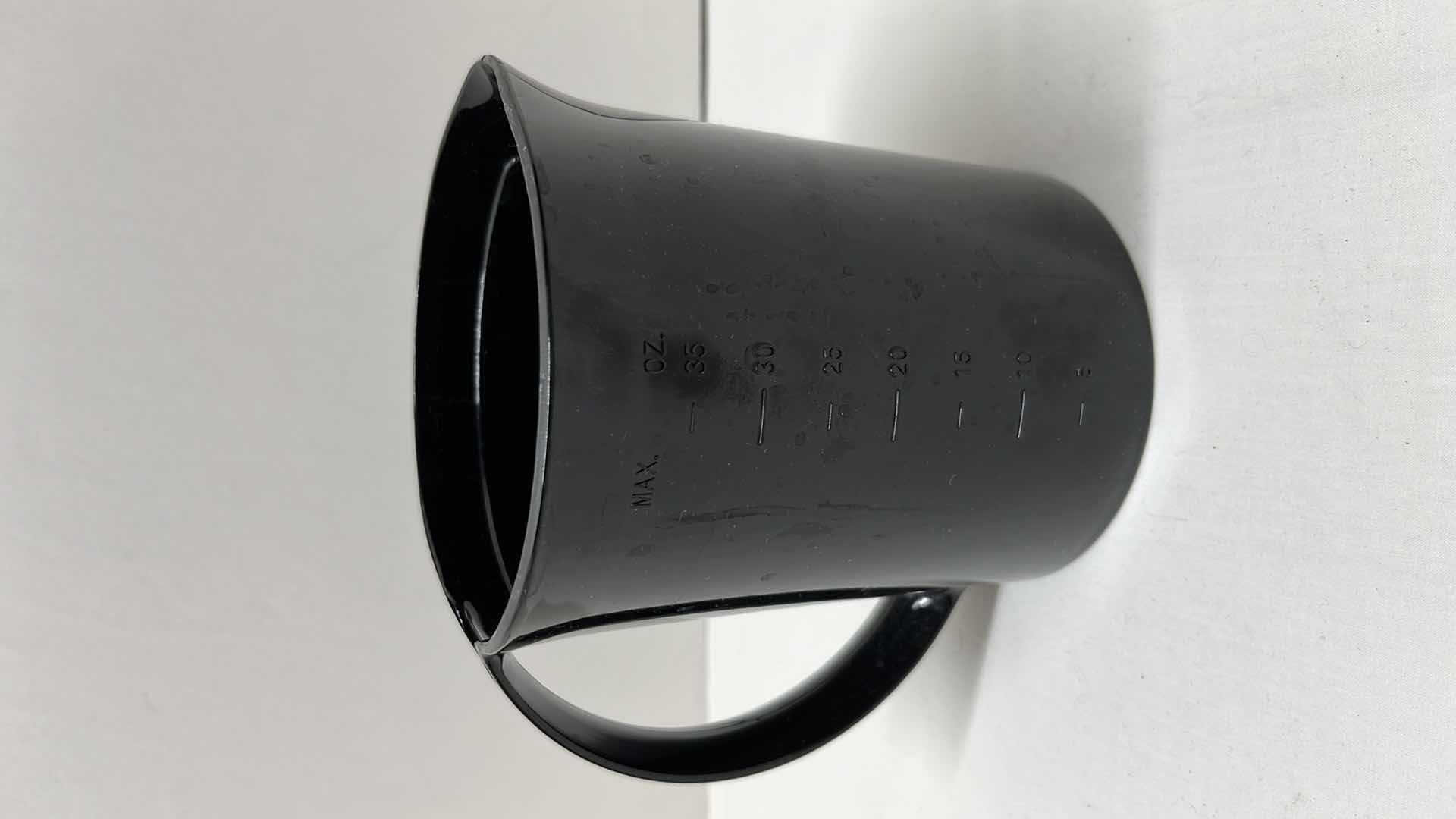 Photo 5 of LARGE MEASURING SIFTER, 35 OZ BLACK MEASURING CUP, 2 COOKIE CUTTERS, 3 LOAF PANS, (4) 3.5” ROUND DOUGH CUTTERS, MEASURING SPOON SET, ROLLING STICK AND DOUGH BLENDER