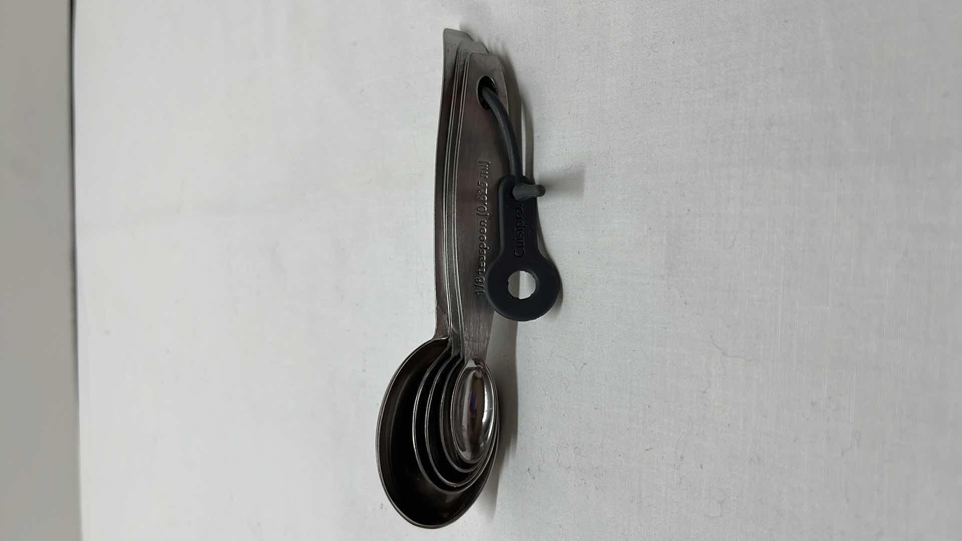 Photo 10 of LARGE MEASURING SIFTER, 35 OZ BLACK MEASURING CUP, 2 COOKIE CUTTERS, 3 LOAF PANS, (4) 3.5” ROUND DOUGH CUTTERS, MEASURING SPOON SET, ROLLING STICK AND DOUGH BLENDER