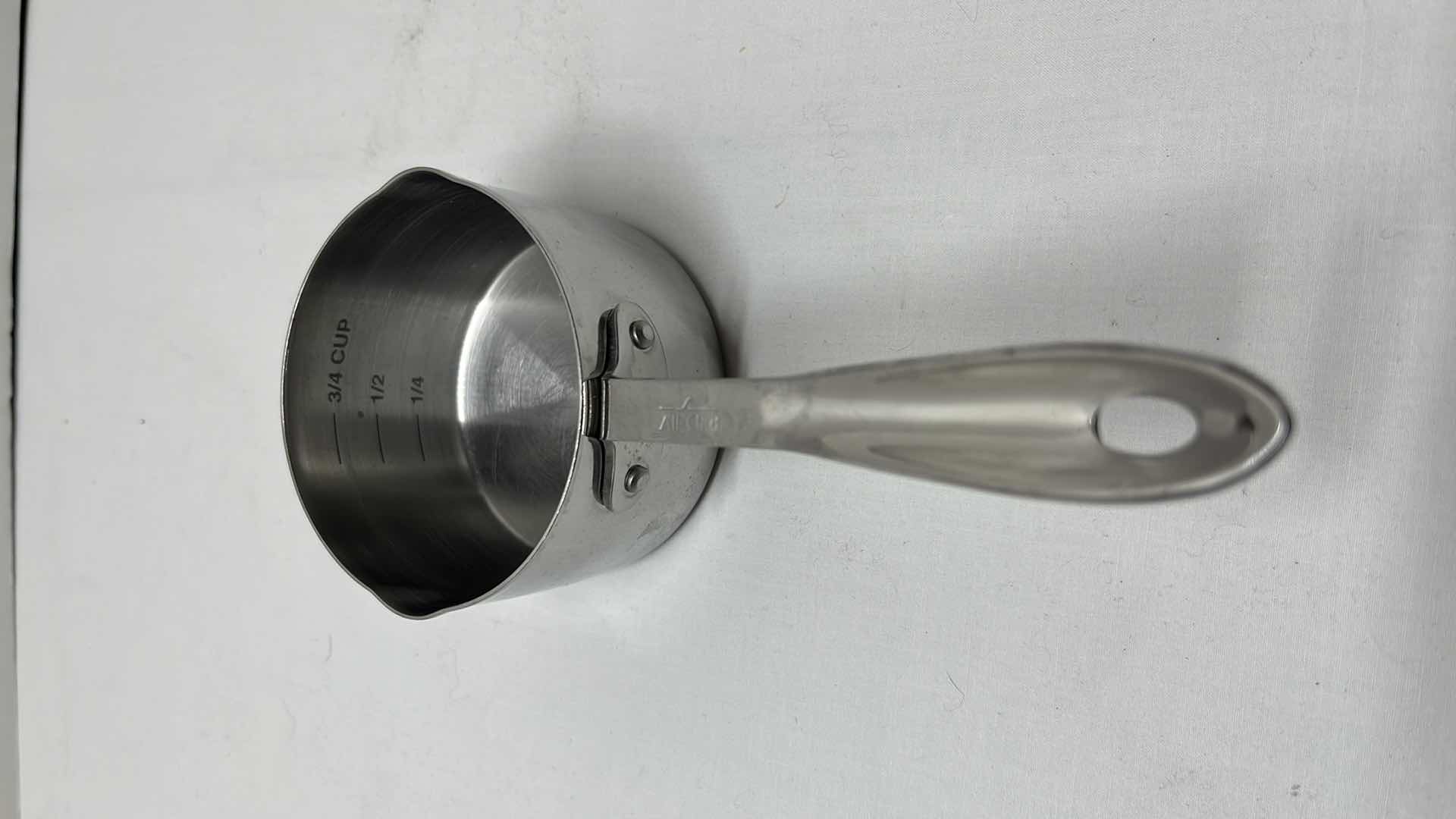 Photo 1 of MIXING BOWLS (2), STEEL MEASURING CUP, MEASURING CUP SET OF 4, ALL-CLAD BUTTER/SAUCE PAN & ALUMINUM CONDIMENT/MEASURING BOWLS (6)