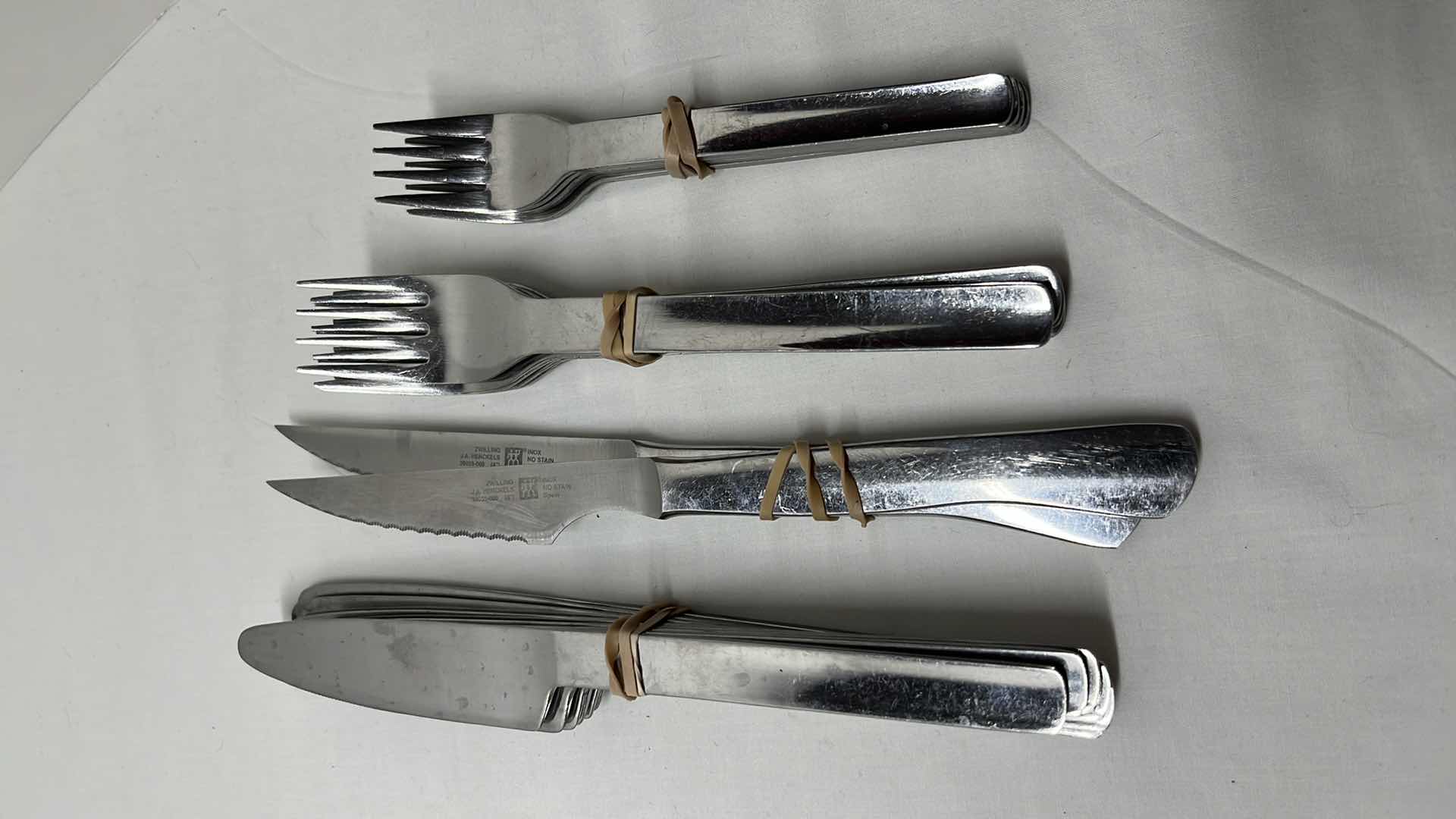 Photo 1 of CHROME STYLE FLATWARE 45 PCS