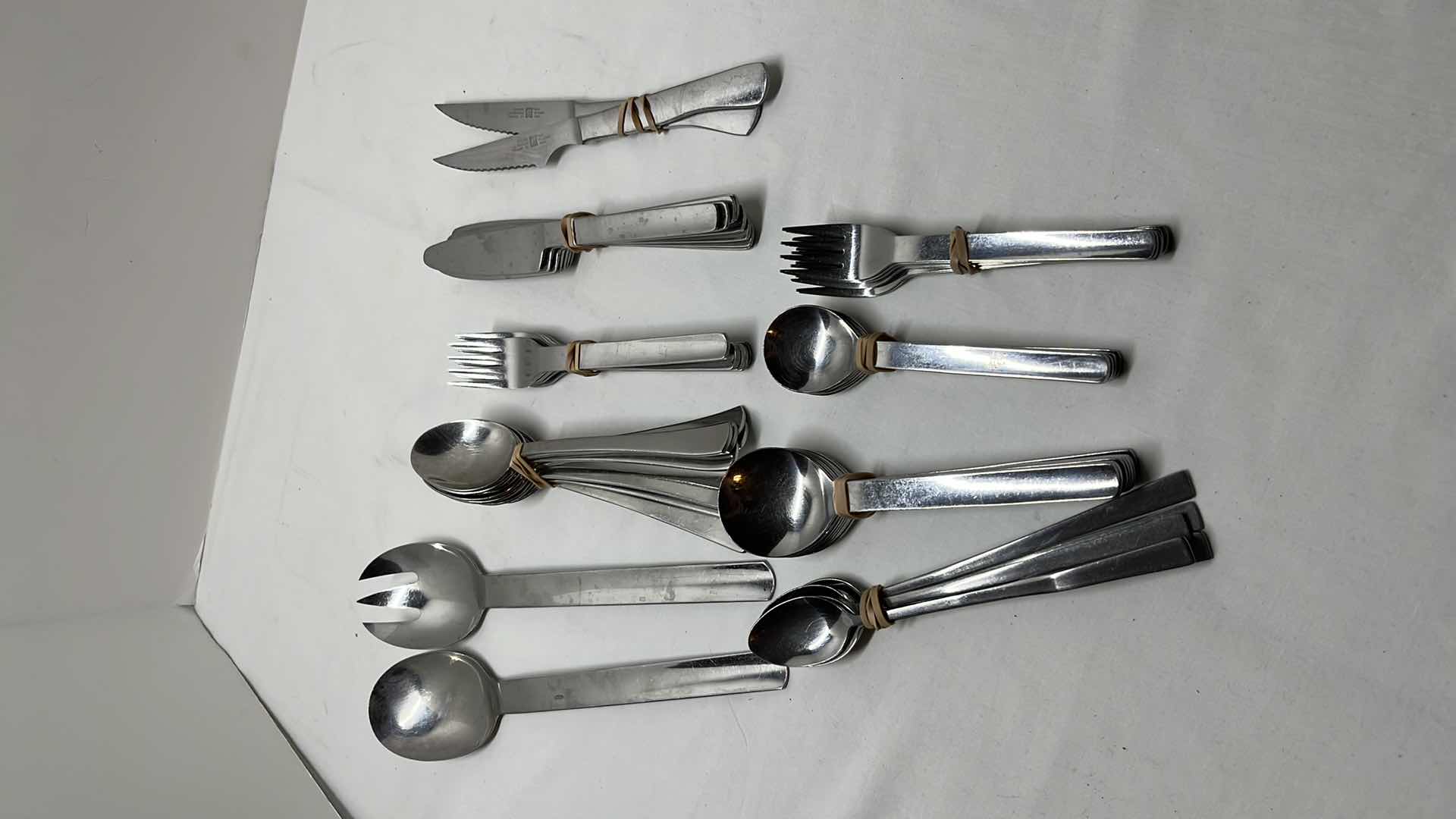 Photo 1 of CHROME STYLE FLATWARE 45 PCS
