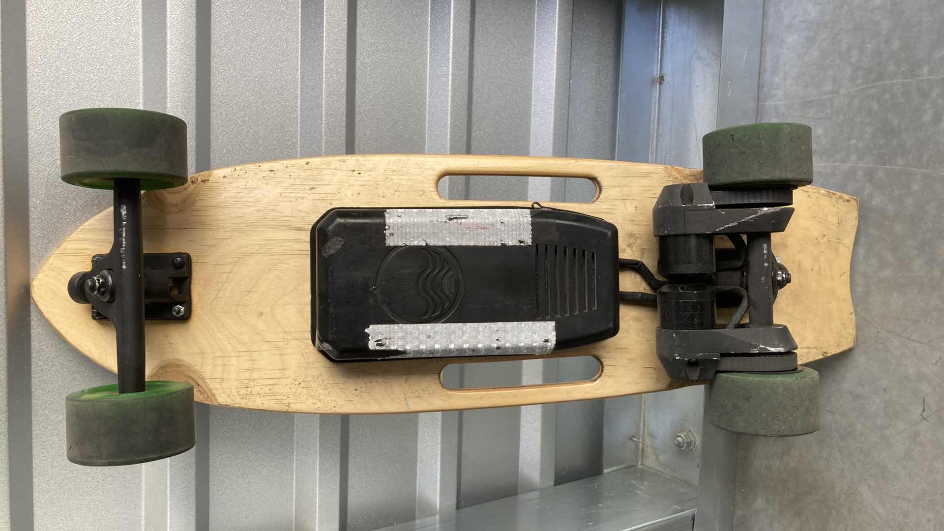 Photo 1 of RIPTIDE MOTORIZED SKATEBOARD W REMOTE