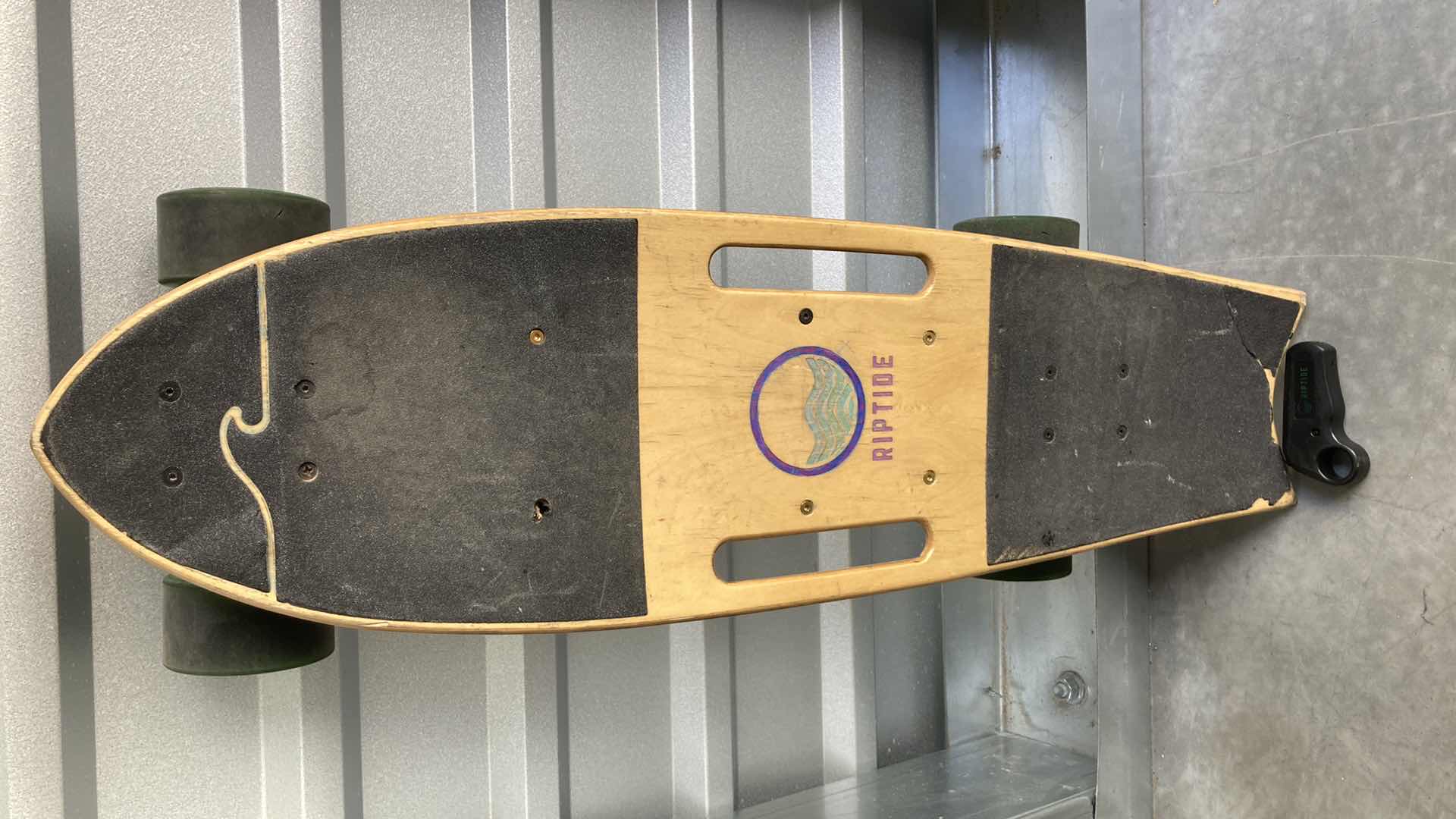 Photo 1 of RIPTIDE MOTORIZED SKATEBOARD W REMOTE