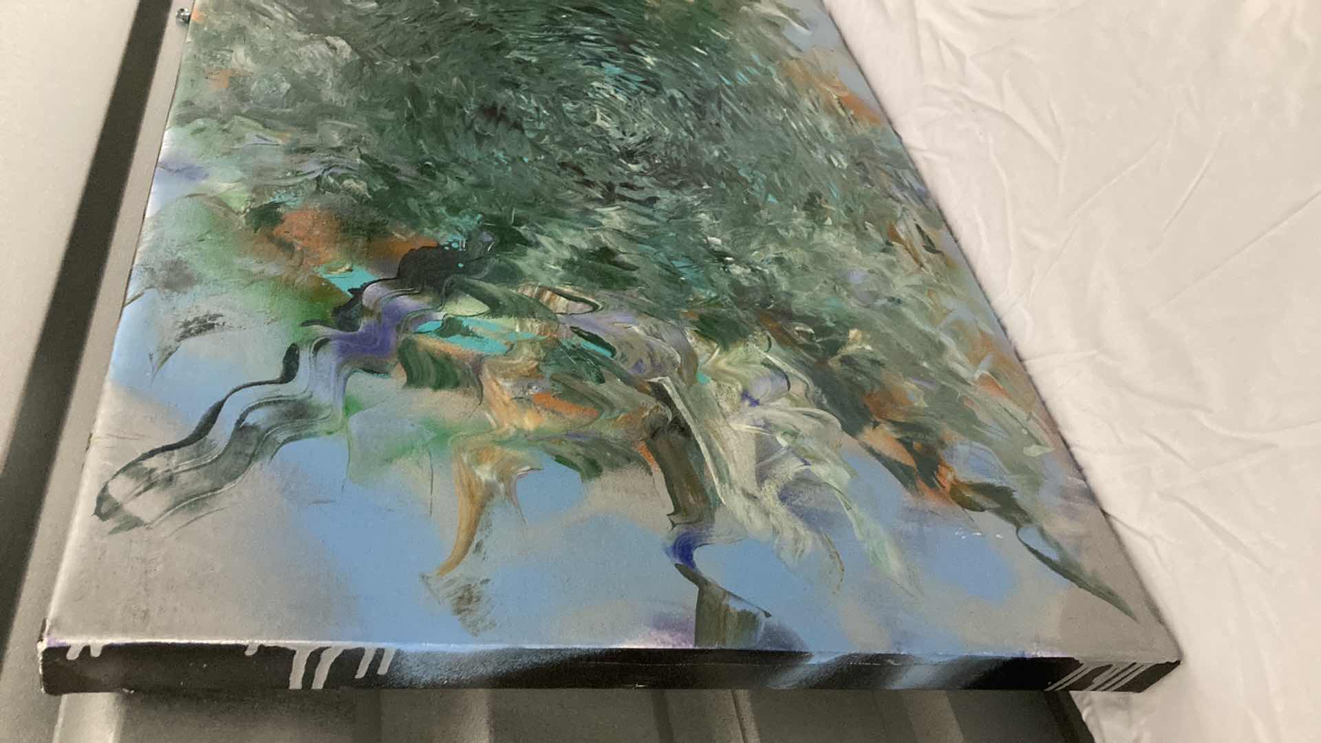 Photo 2 of RIPPLING PAINTED CANVAS ARTWORK BY LOCAL ARTIST 32” X 21”