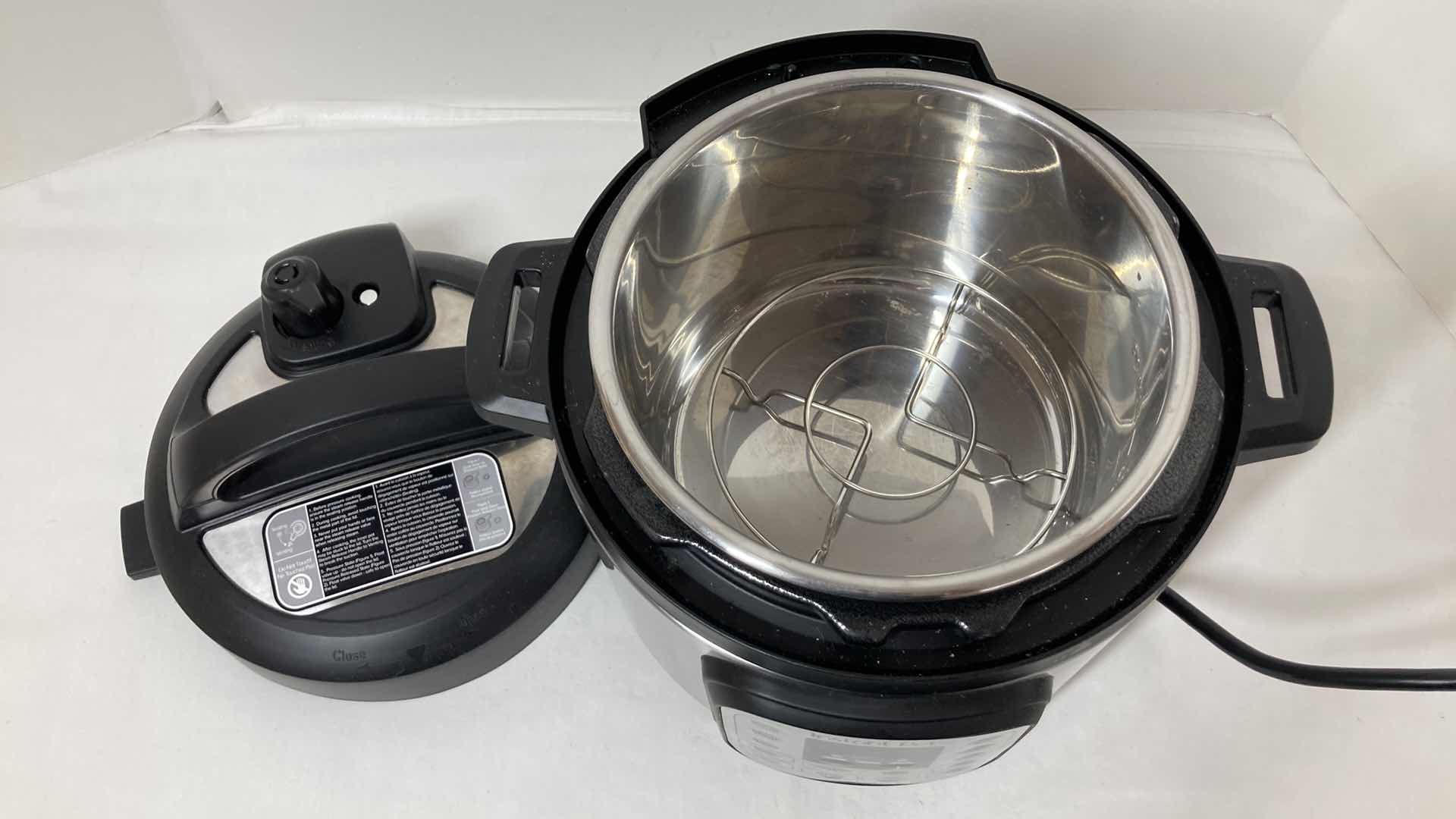 Photo 1 of INSTANT POT ELECTRIC PRESSURE COOKER MODEL DUO MINI