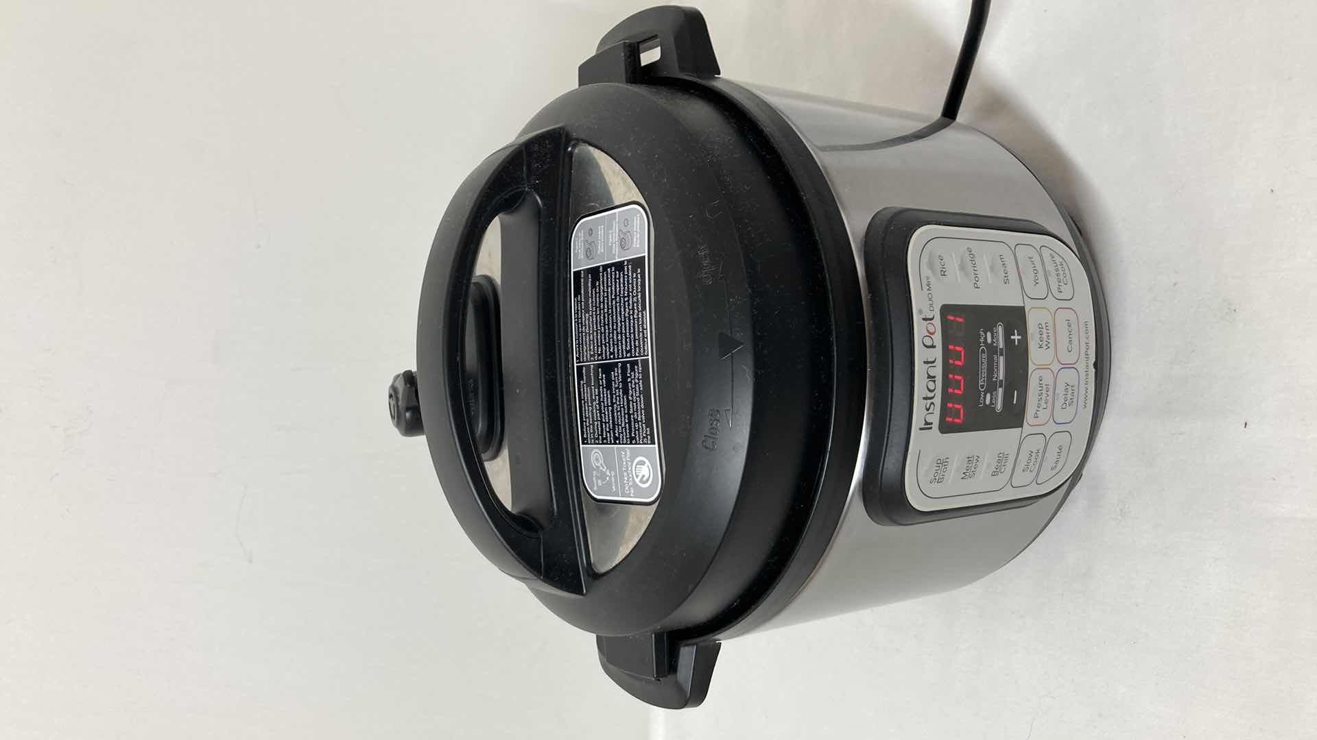 Photo 1 of INSTANT POT ELECTRIC PRESSURE COOKER MODEL DUO MINI