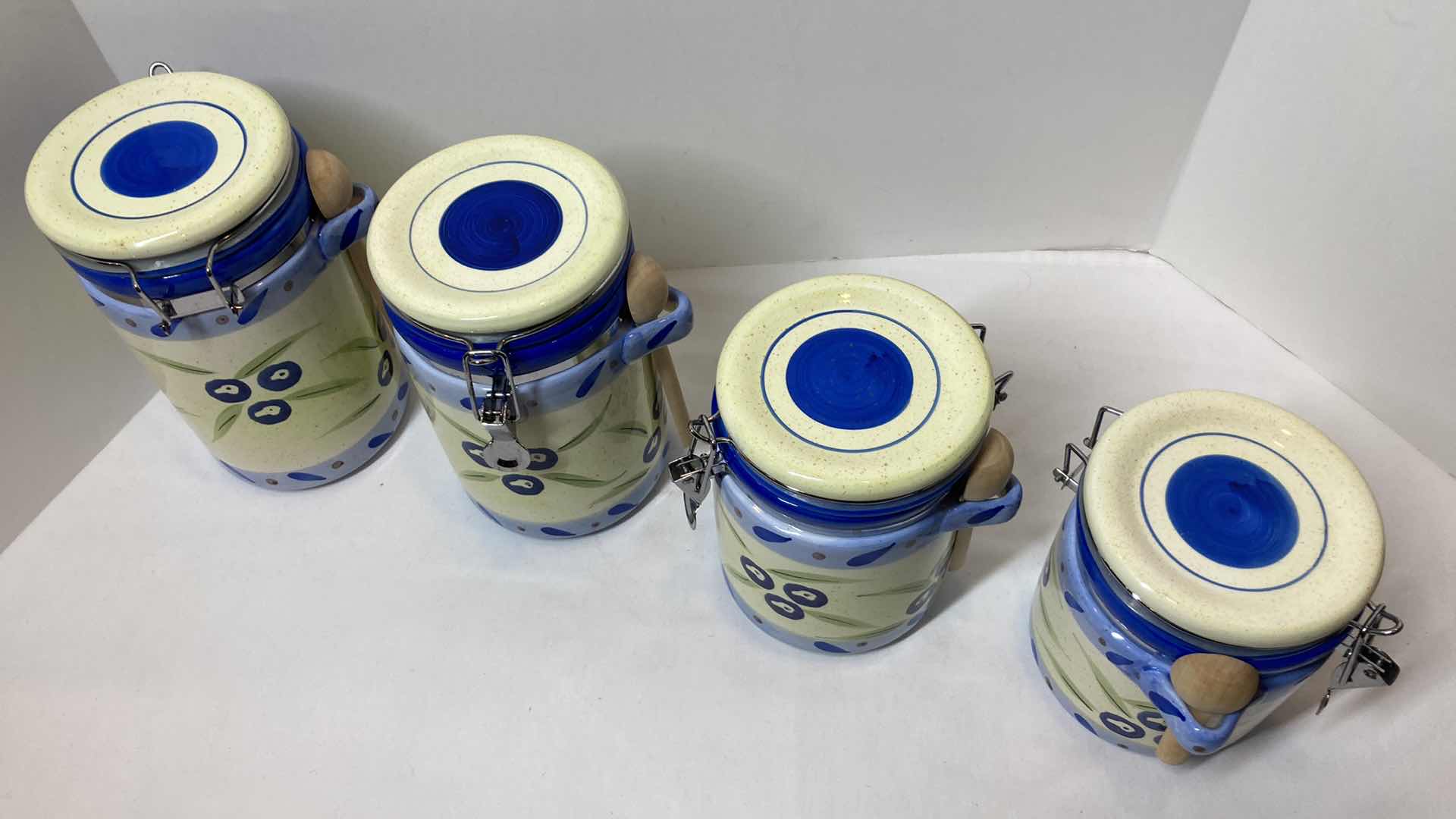 Photo 2 of METRO MARKETING ITALIAN ART STYLE CERAMIC DRY STORAGE CANISTERS W WOOD SPOONS (4)