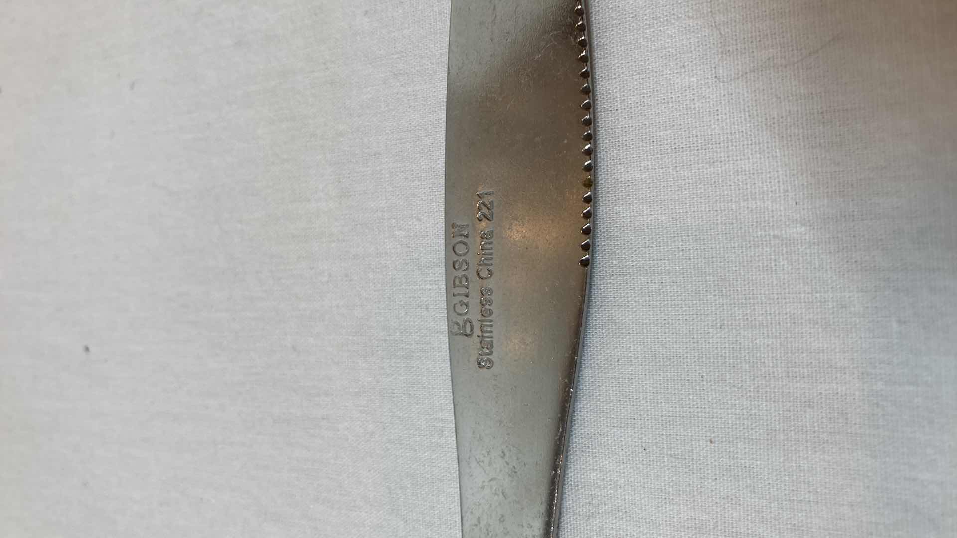 Photo 1 of GIBSON STAINLESS STEEL FLATWARE SET W HOLDER