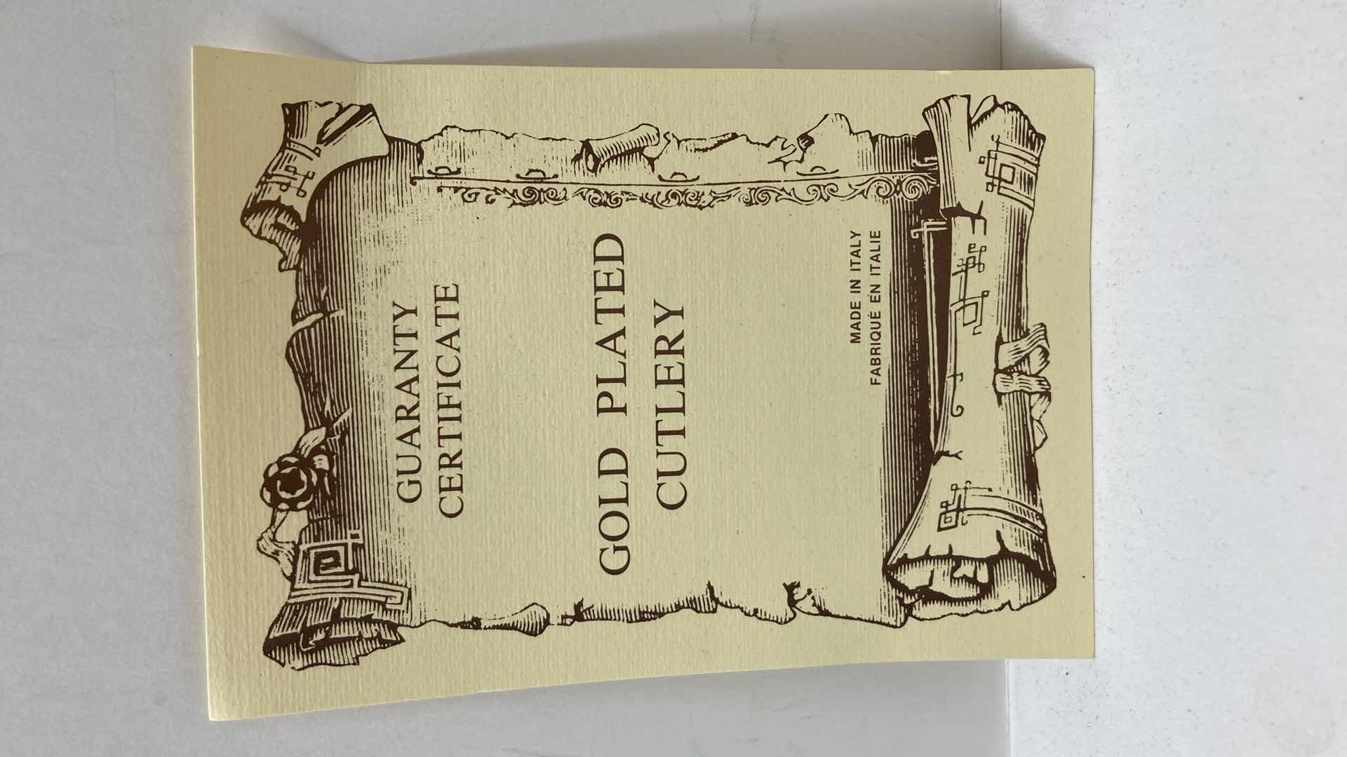 Photo 1 of LBL ITALY GOLD FINISH EP ZINC PLATED FLATWARE (36) W VARIOUS GOLD FINISH SERVING WARE (2) & FLATWARE RACK