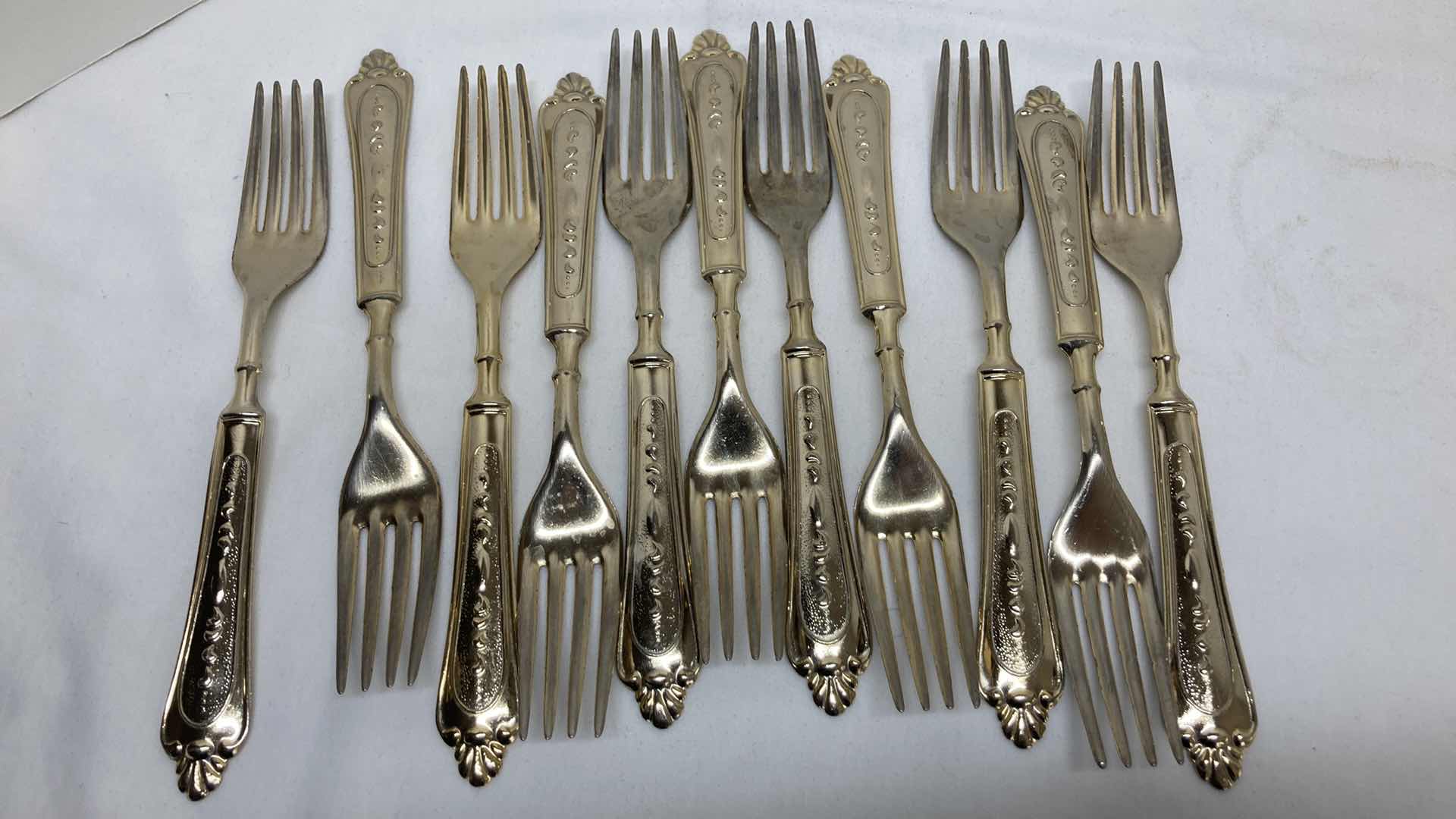 Photo 1 of LBL ITALY GOLD FINISH EP ZINC PLATED FLATWARE (36) W VARIOUS GOLD FINISH SERVING WARE (2) & FLATWARE RACK