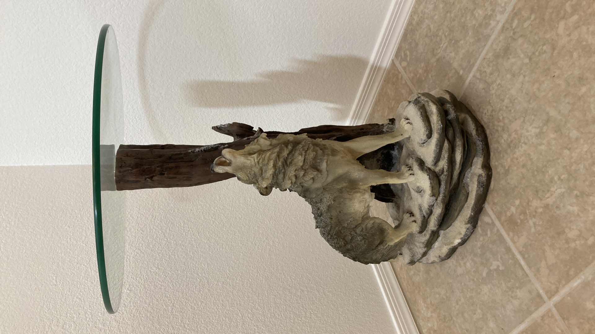 Photo 2 of HOWLING WOLF RESIN BASE GLASS TOP SIDE TABLE 19.5” X 26”