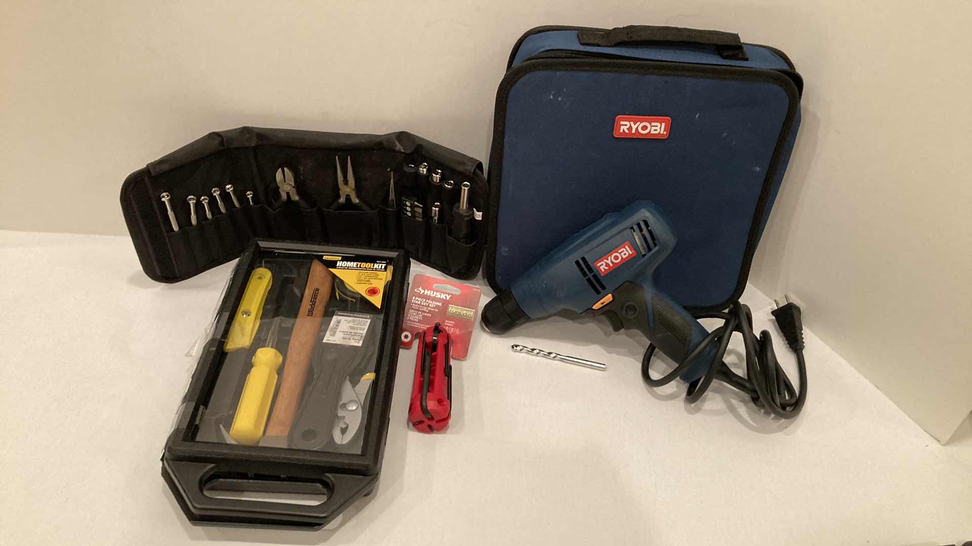 Photo 1 of RYOBI CORDED DRILL W TOOL SET