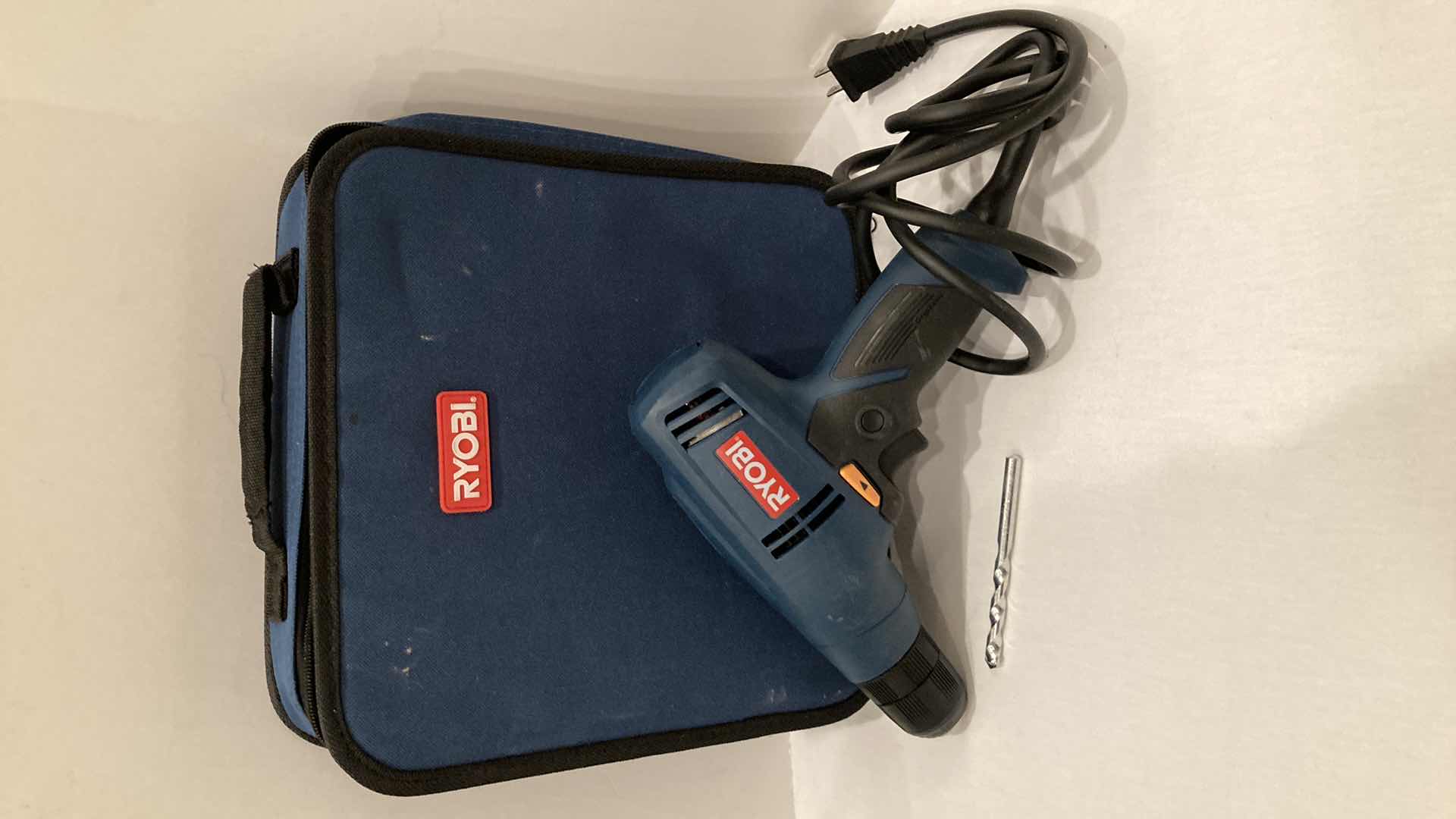 Photo 1 of RYOBI CORDED DRILL W TOOL SET