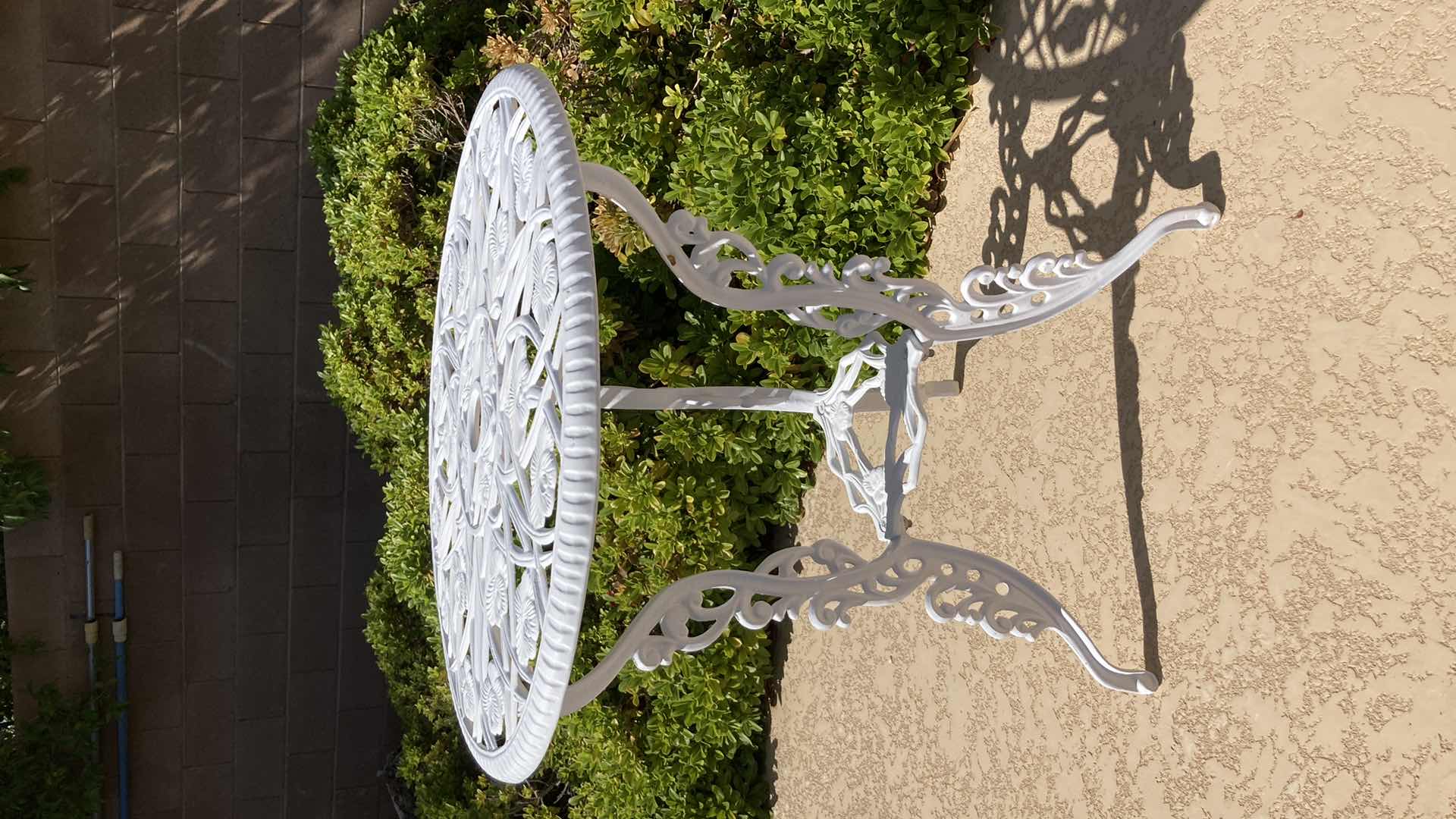 Photo 1 of ORNATE FLORAL PATTERN ROUND PATIO TABLE 24” X 26”