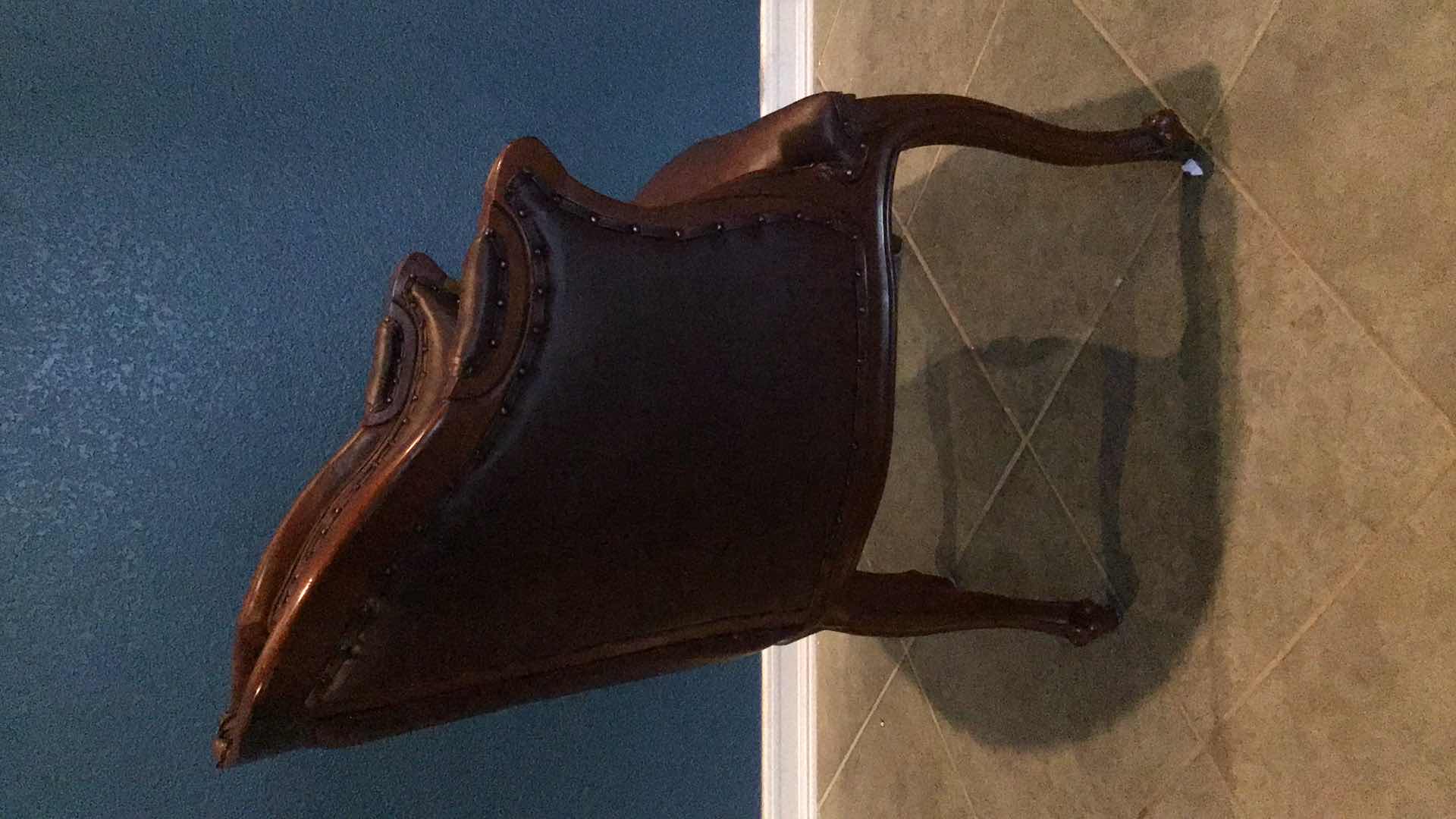 Photo 1 of CARVED WOOD AND LEATHER ARMCHAIR 29” X 28 H39”