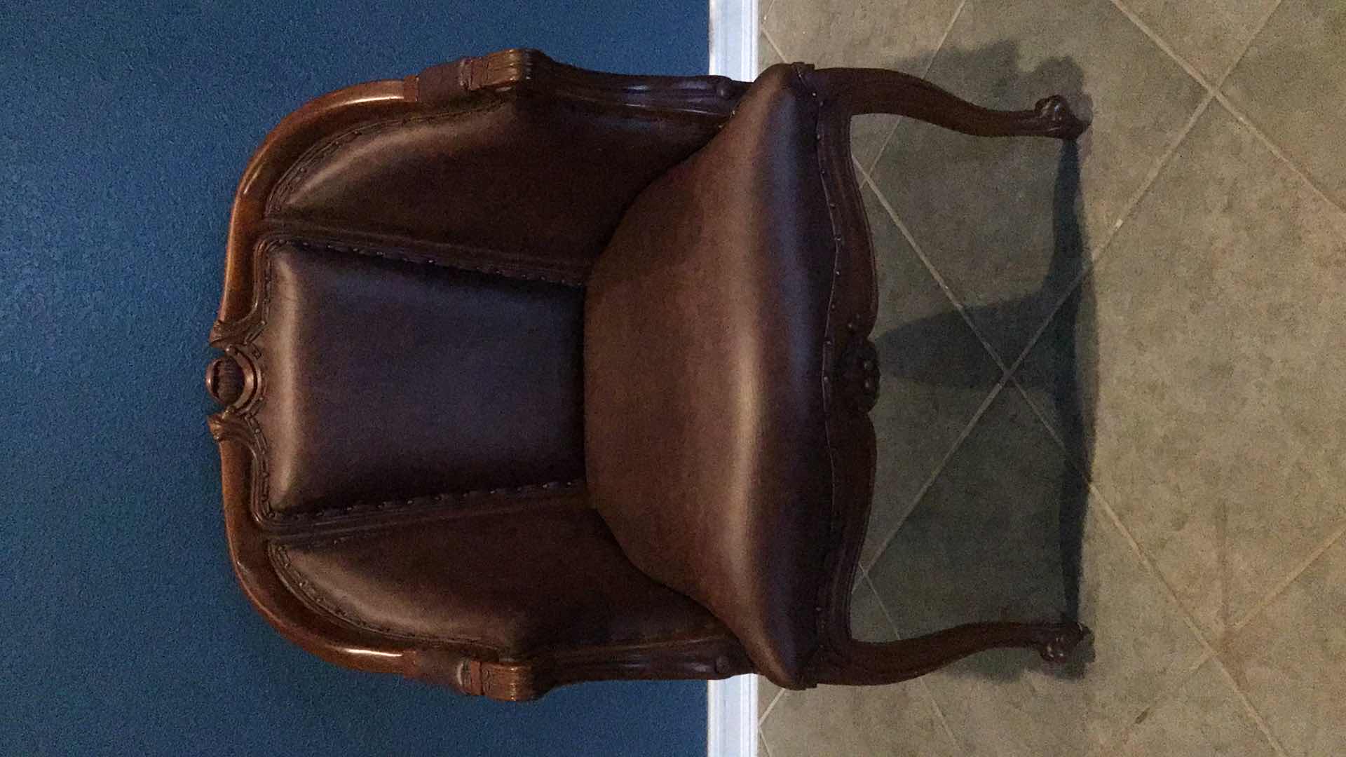 Photo 1 of CARVED WOOD AND LEATHER ARMCHAIR 29” X 28 H39”