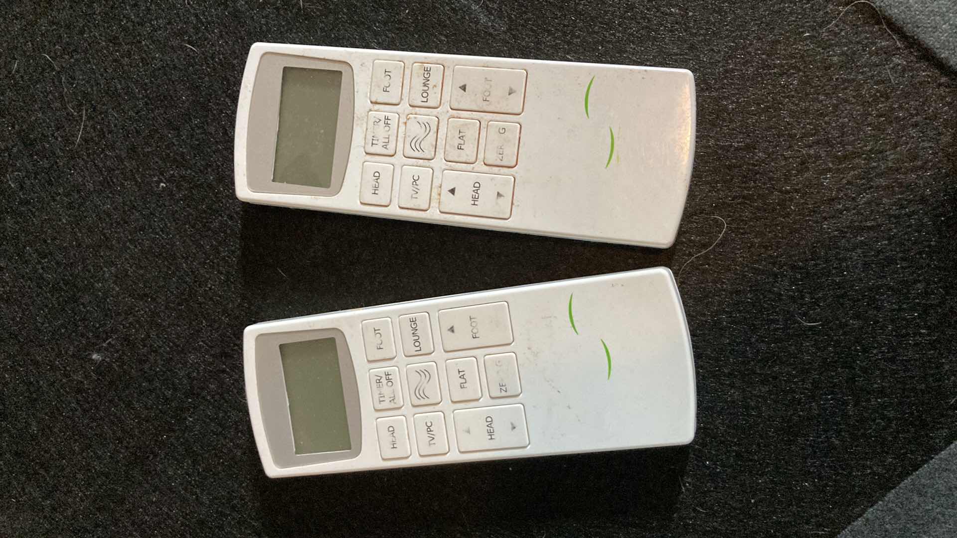 Photo 1 of MASSAGING ZERO GRAVITY ADJUSTABLE DUAL SIDED GRAY UPHOLSTERED BED W 2 WIRELESS REMOTES 81” X 87” H61.5