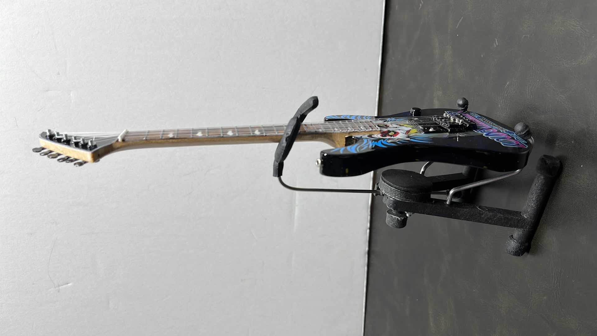 Photo 2 of RONZ WORLD AXE HEAVEN LOUDER THAN LIFE 2022 MINIATURE GUITAR W STAND IN ORIGINAL BOX,  3” X .75” H10”