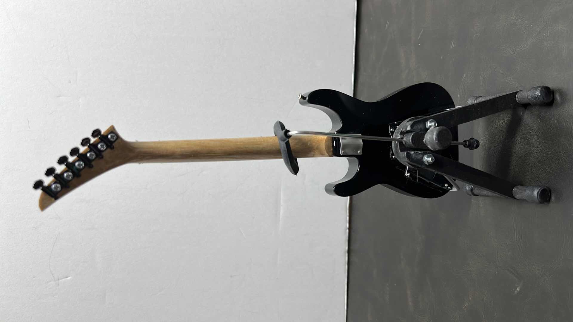 Photo 1 of RONZ WORLD AXE HEAVEN LOUDER THAN LIFE 2022 MINIATURE GUITAR W STAND IN ORIGINAL BOX,  3” X .75” H10”