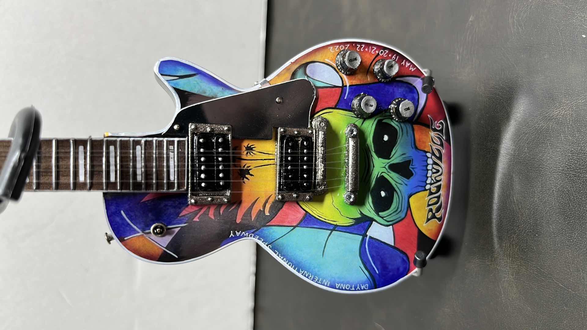 Photo 1 of RONZ WORLD AXE HEAVENWELCOME TO ROCKVILLE 2022 MINIATURE GUITAR W STAND IN ORIGINAL BOX,  3.25 ” X .75” H10”