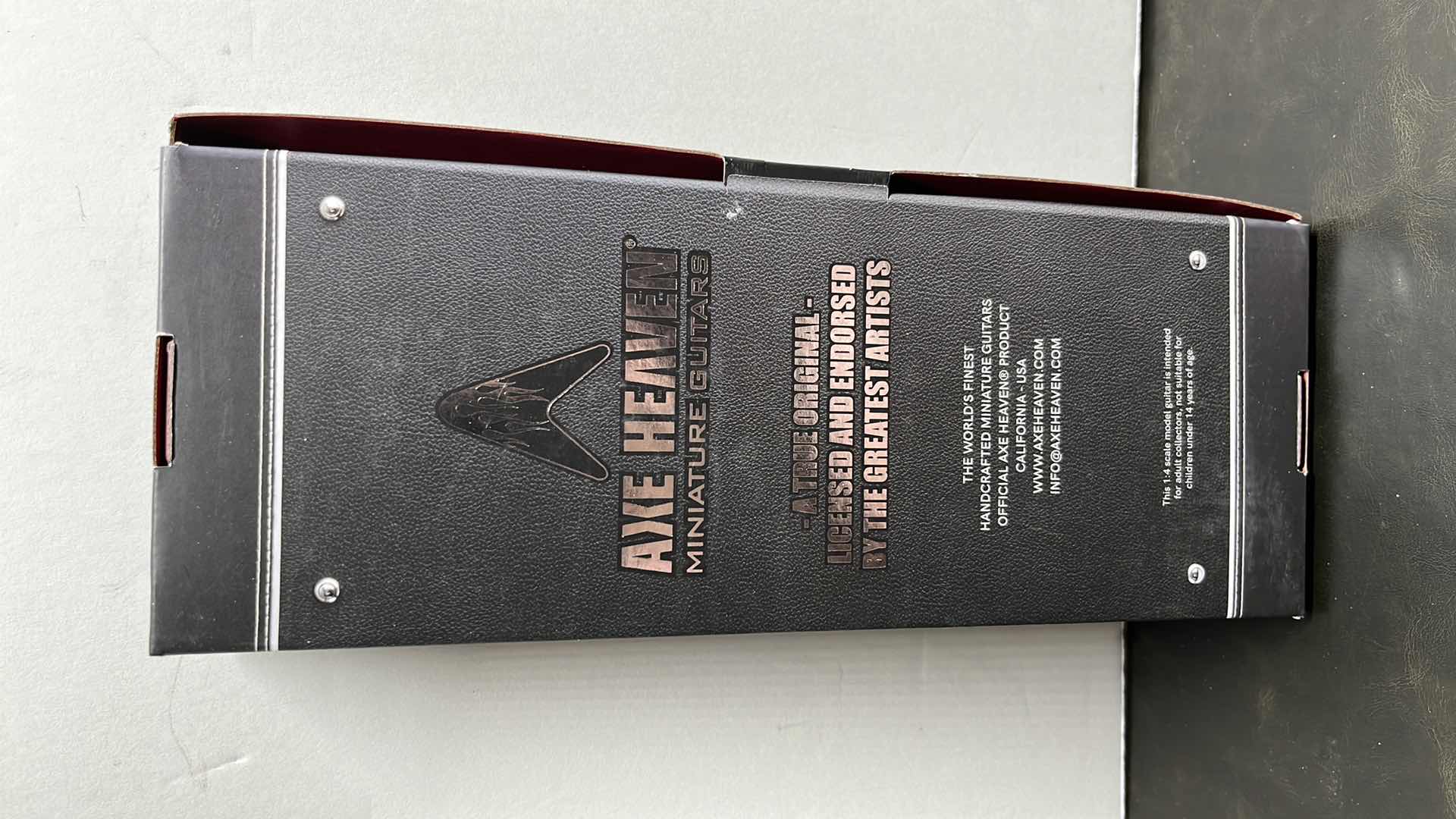 Photo 9 of RONZ WORLD AXE HEAVENWELCOME TO ROCKVILLE 2022 MINIATURE GUITAR W STAND IN ORIGINAL BOX,  3.25 ” X .75” H10”