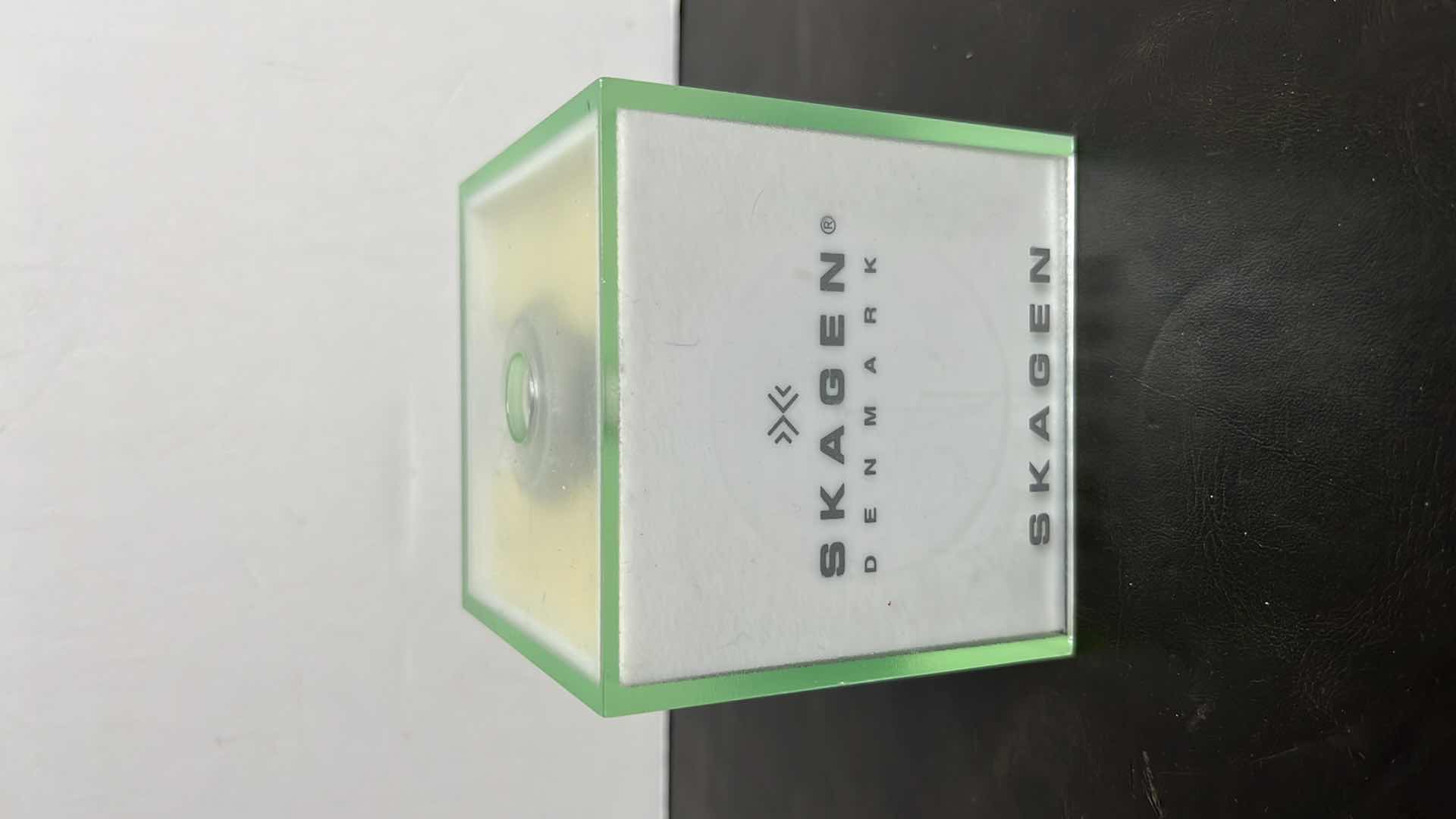 Photo 1 of MENS SKAGEN DENMARK STAINLESS STEEL CASE MULTIFUNCTION WATCH W RUBBER STRAP, BLACK DIAL W ROSE GOLD INDICATORS IN ORIGINAL BOX, MODEL 377LSRBO