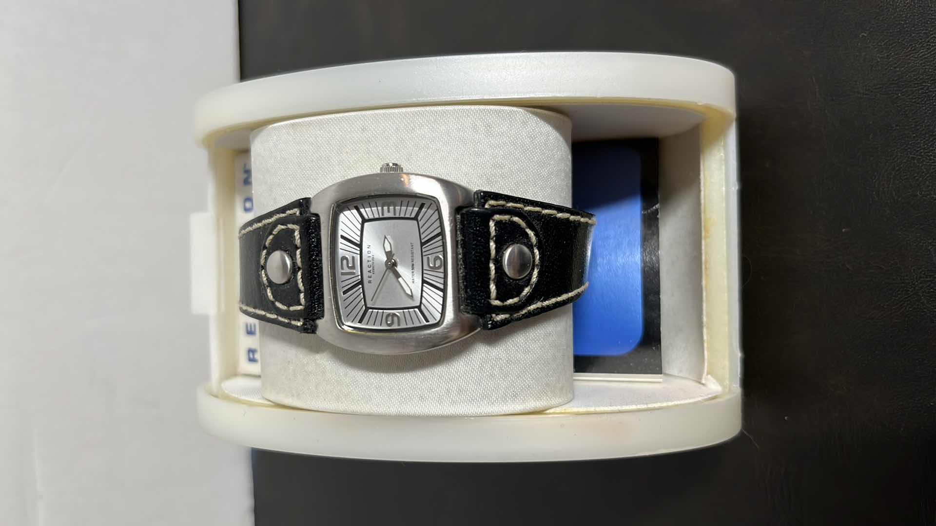 Photo 1 of WOMENS KENNETH COLE REACTION WATER RESISTANT ANALOG WATCH W GENUINE LEATHER STRAP IN CASE, MODEL F98-03-RK2078