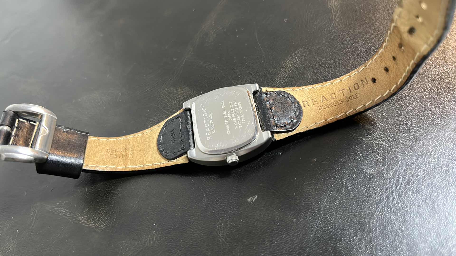 Photo 1 of WOMENS KENNETH COLE REACTION WATER RESISTANT ANALOG WATCH W GENUINE LEATHER STRAP IN CASE, MODEL F98-03-RK2078