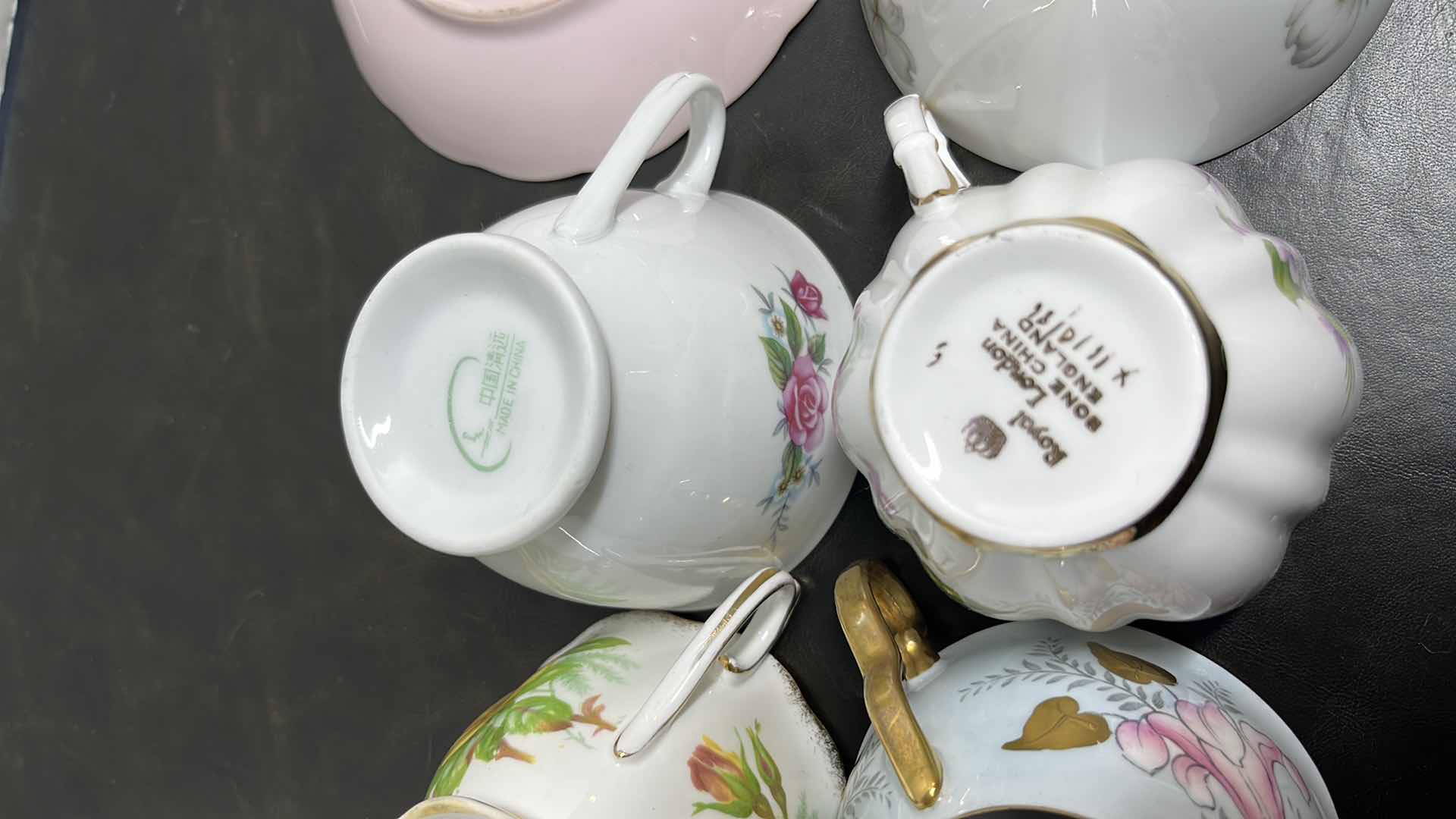 Photo 1 of ECLECTIC BONE & FINE CHINA 9 TEA CUPS/SAUCERS (18 PCS)