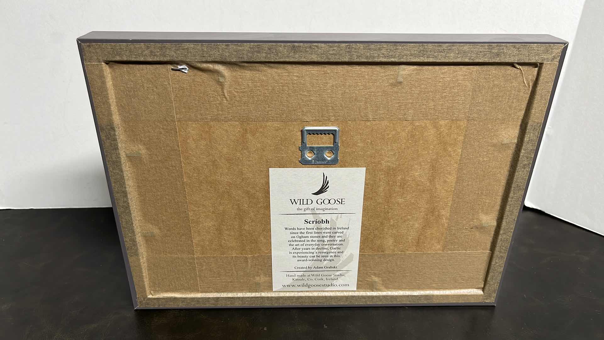 Photo 1 of WILD GOOSE STUDIOS GRA DILSEACHT CAIRDEAS “LOVE LOYALTY FRIENDSHIP” CARVED BRONZED IRON W WARM GREY WOOD FRAME 1” X 11.55” H8.4”