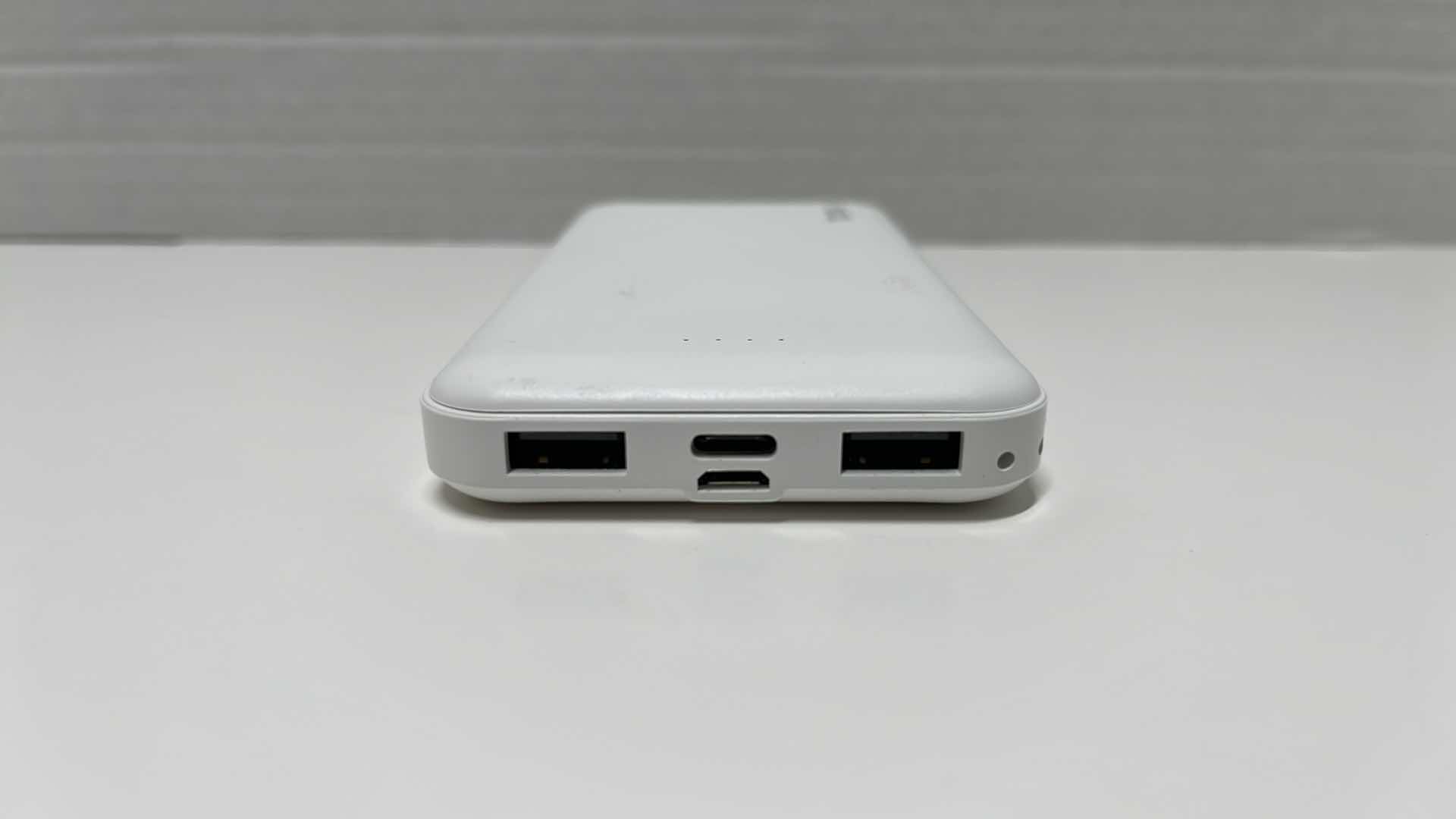 Photo 1 of MIADY 10000mAh DUAL USB PORTABLE CHARGER FAST CHARGING POWER BANK W USB TYPE C CORD, MODEL AS-TPB21