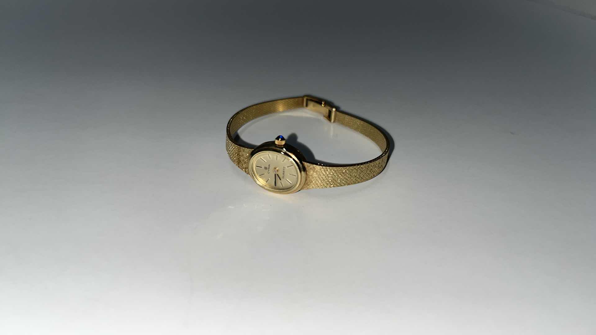 Photo 1 of CYMA LADIES 14K YELLOW GOLD QUARTZ WATCH W OVAL CHAMPAGNE DIAL & 14K SOLID GOLD MESH BRACELET .25” X 6.75”