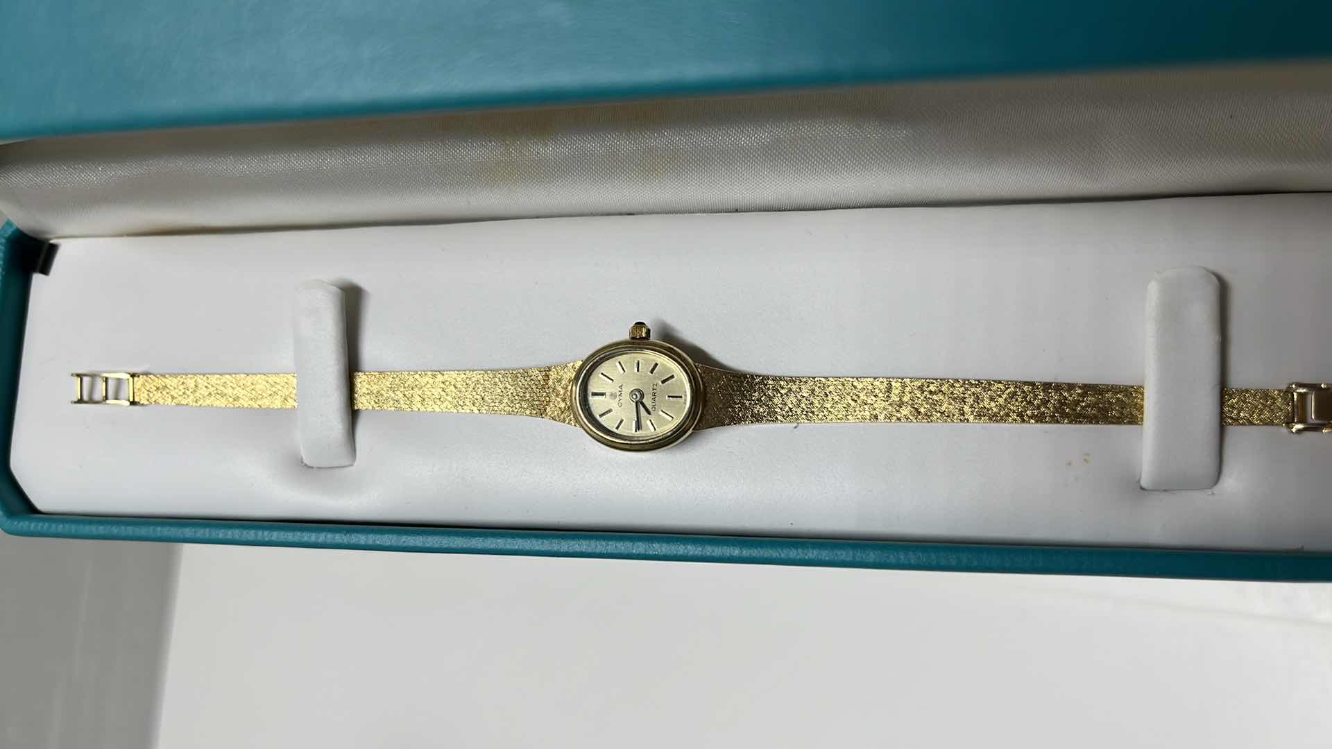 Photo 1 of CYMA LADIES 14K YELLOW GOLD QUARTZ WATCH W OVAL CHAMPAGNE DIAL & 14K SOLID GOLD MESH BRACELET .25” X 6.75”